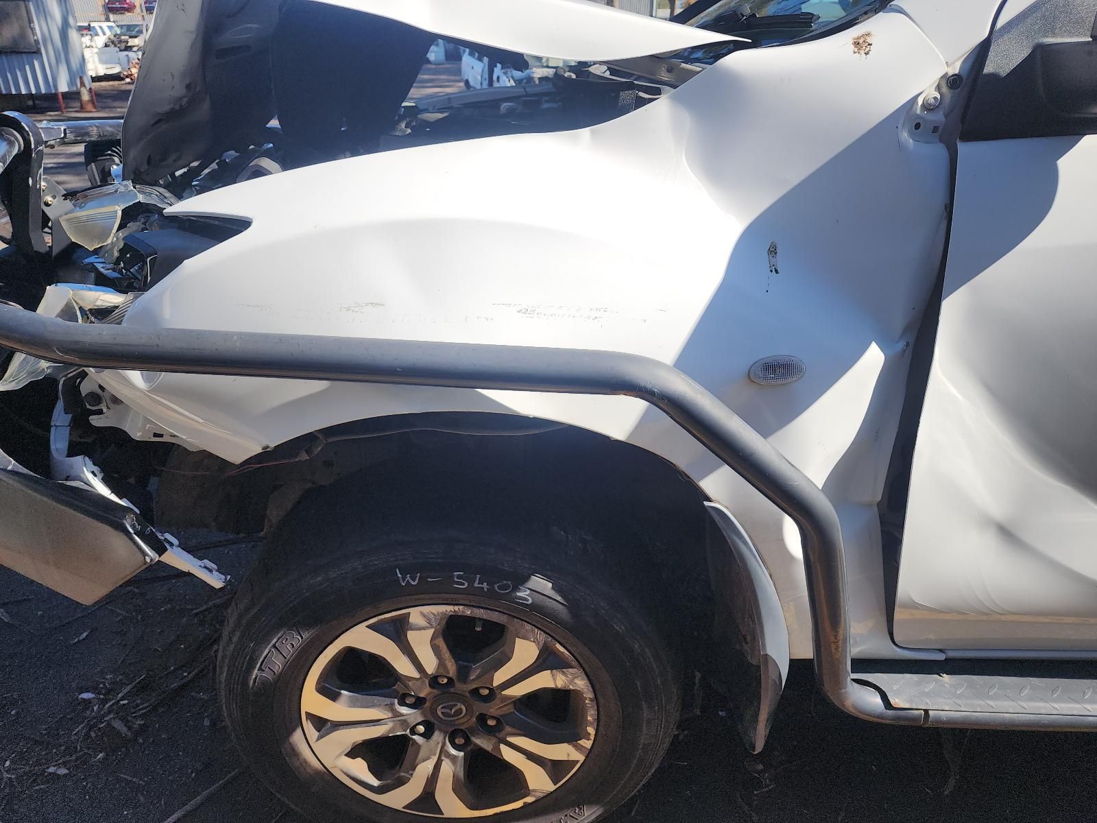 Severely Damaged White SUV — South West 4WD Wreckers In Harristown, QLD