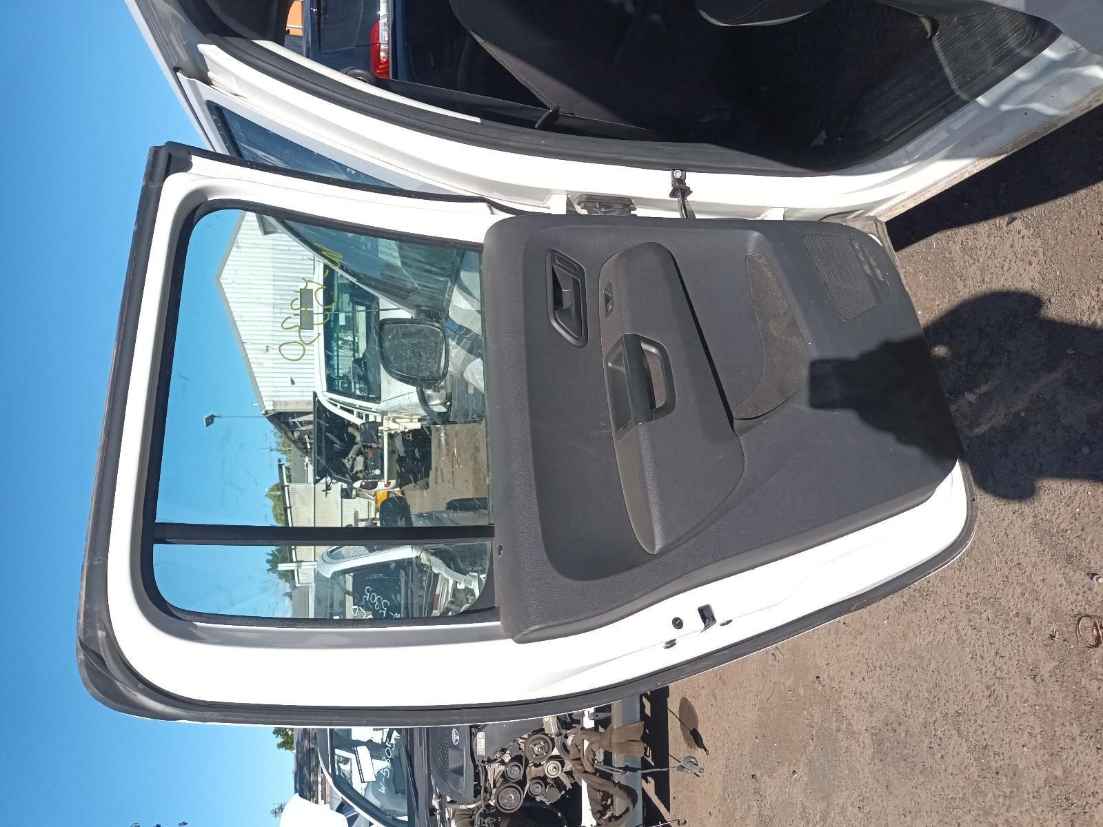 Open White Car Door Showing Black Interior — South West 4WD Wreckers In Harristown, QLD