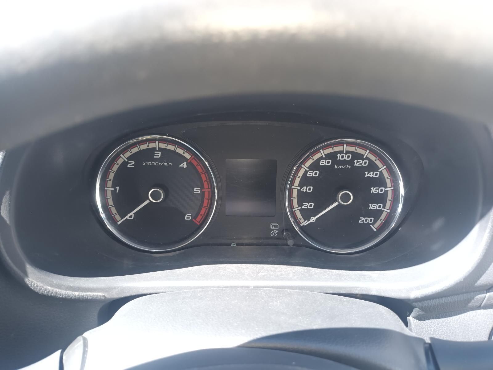 Car Dashboard with Two Black Analog Gauges and A Small Central Display — South West 4WD Wreckers In Harristown, QLD
