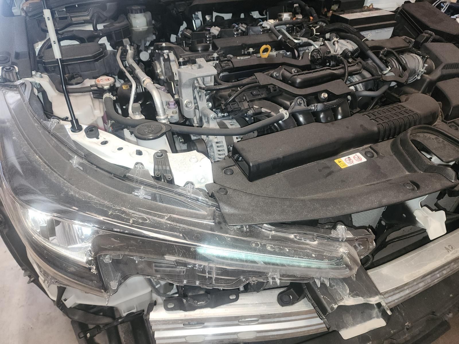 Front of a Car With the Hood Open — South West 4WD Wreckers In Harristown, QLD