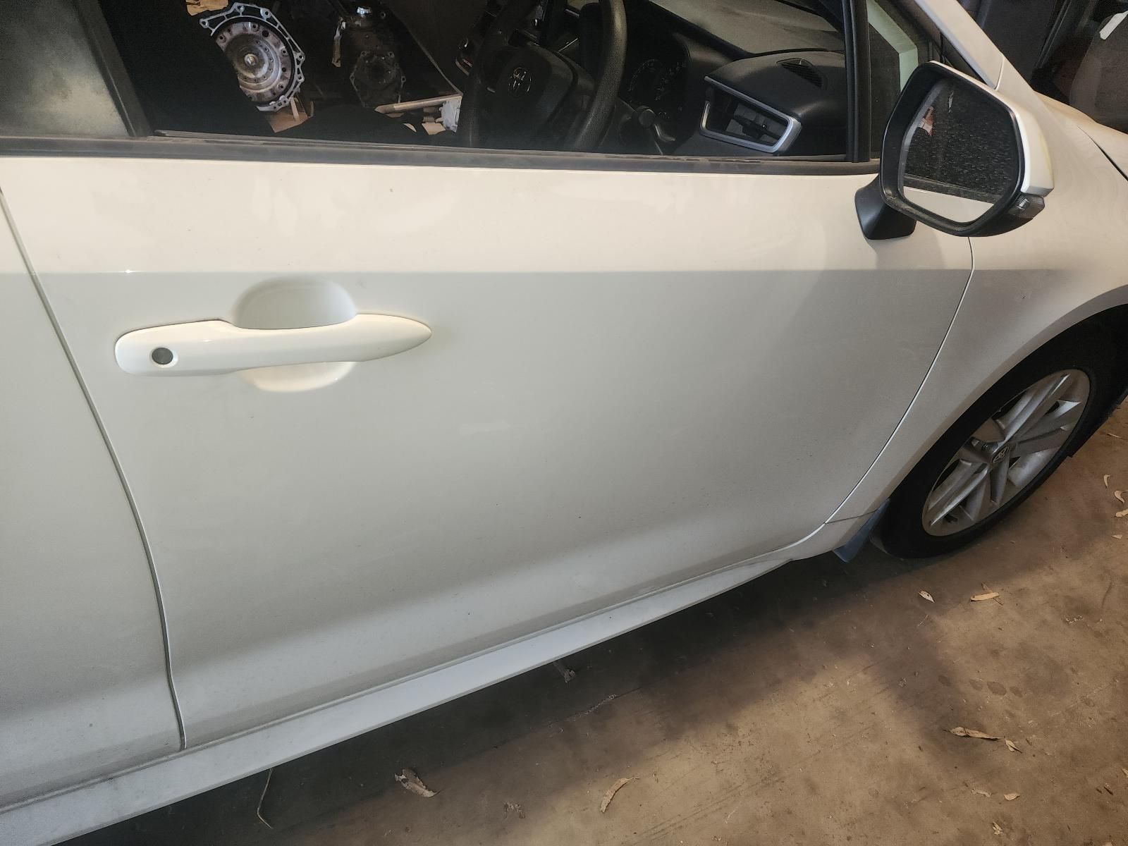 Silver Car Side Door With Rear Wheel Visible — South West 4WD Wreckers In Harristown, QLD