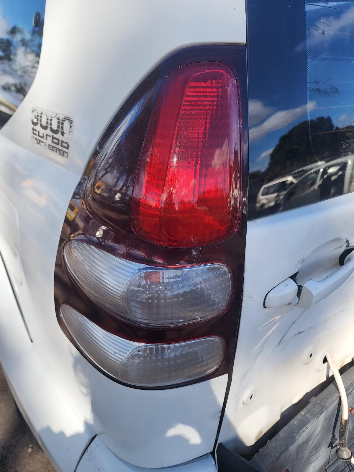 Rear View of a White SUV — South West 4WD Wreckers In Harristown, QLD
