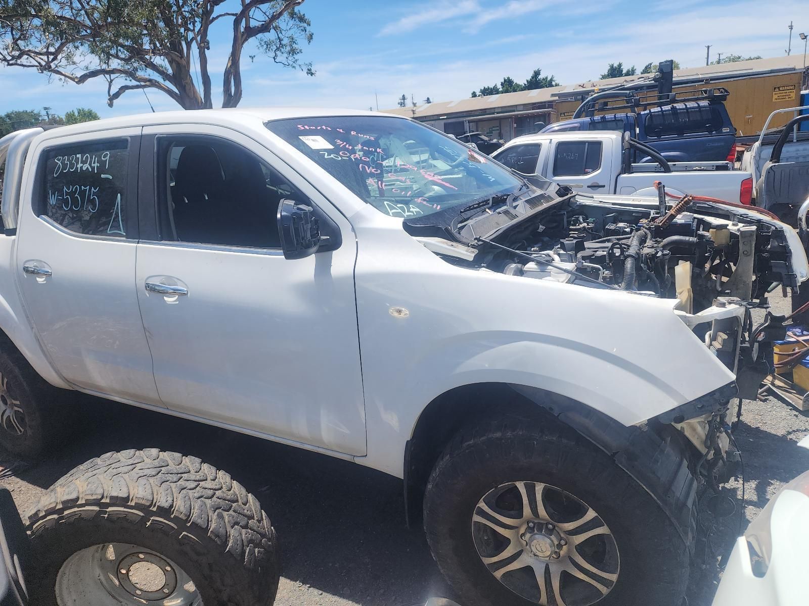 White Pickup Truck With Severe Front-end Damage — South West 4WD Wreckers In Harristown, QLD