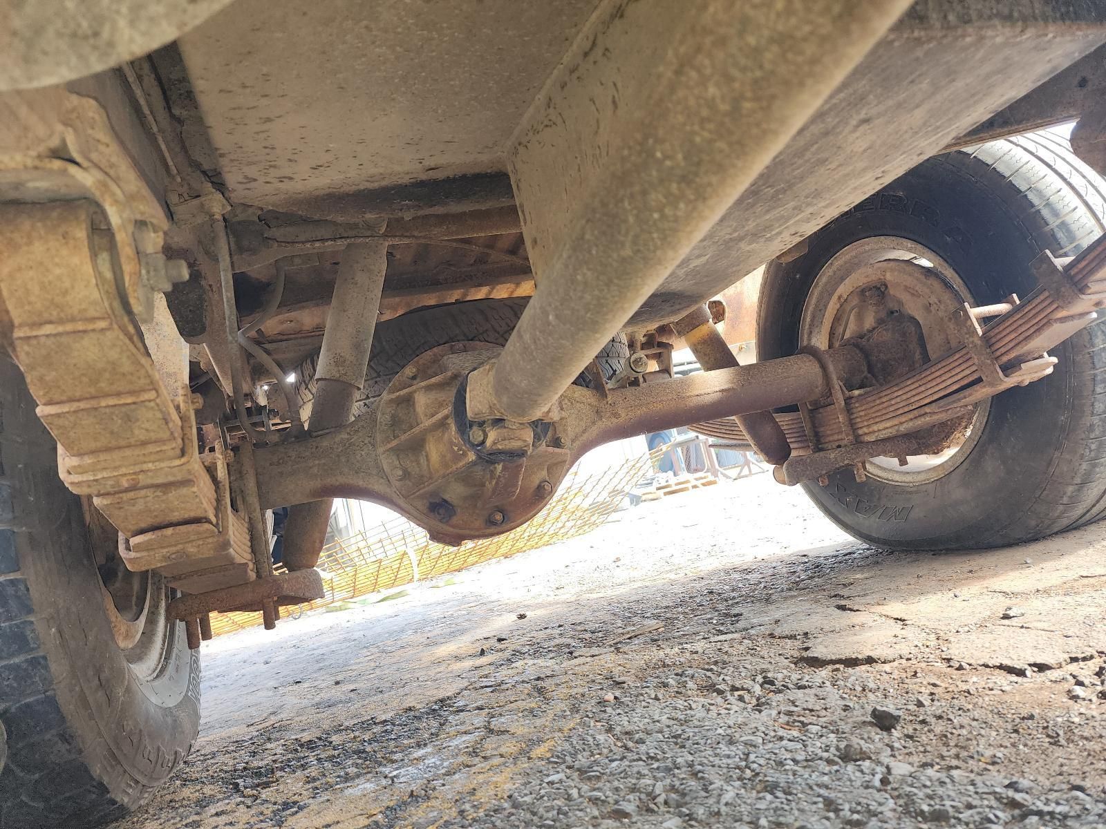 Undercarriage of a Muddy Off-road Vehicle — South West 4WD Wreckers In Harristown, QLD