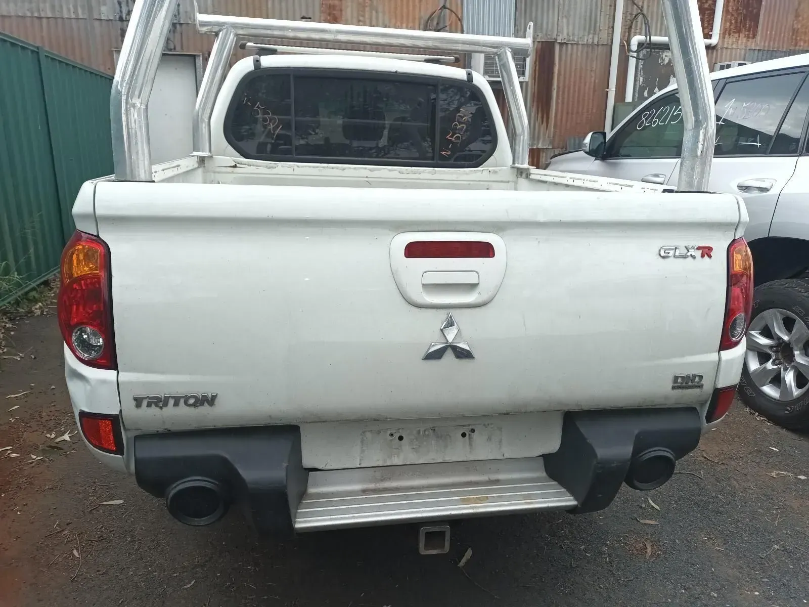 White Mitsubishi Triton Truck — South West 4WD Wreckers In Harristown, QLD
