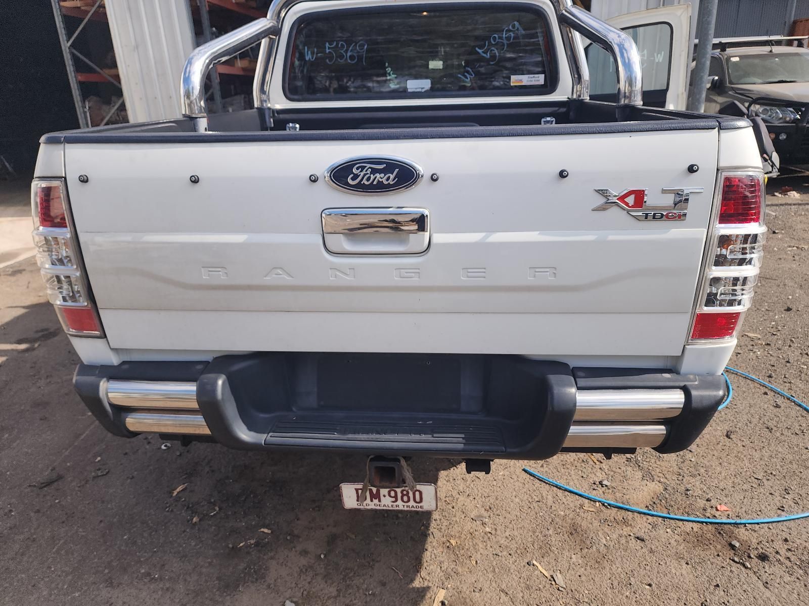 Rear View of a White Ford Pickup Truck — South West 4WD Wreckers In Harristown, QLD