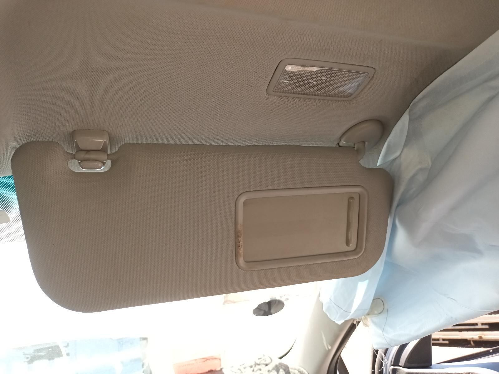 Car Sun Visor Lowered Beside a Rearview Mirror — South West 4WD Wreckers In Harristown, QLD