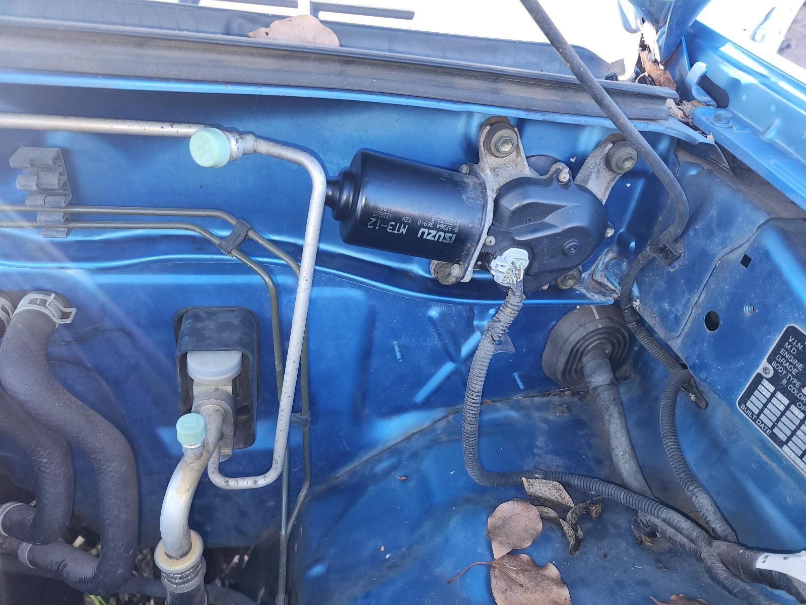 Blue Car Engine Bay With Black Motor, Metal Lines — South West 4WD Wreckers In Harristown, QLD