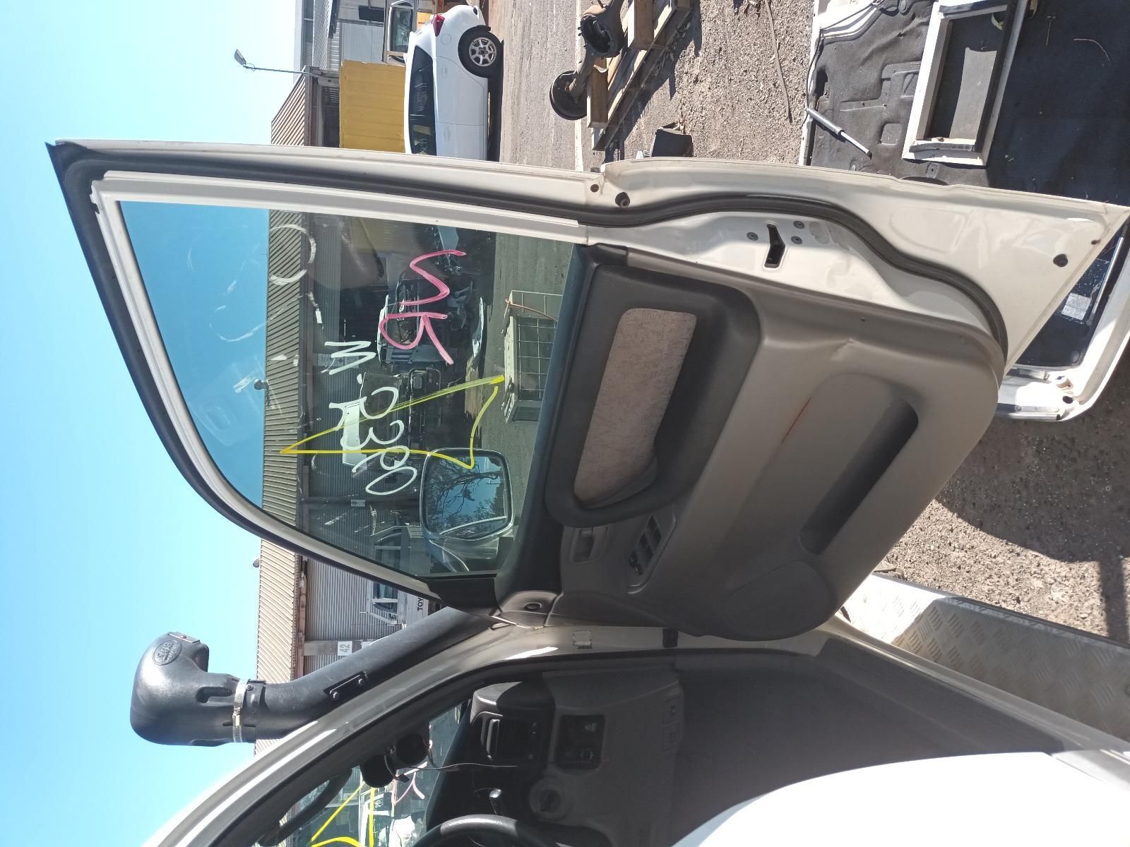 Open Car Door with Colorful Graffiti on The Window — South West 4WD Wreckers In Harristown, QLD