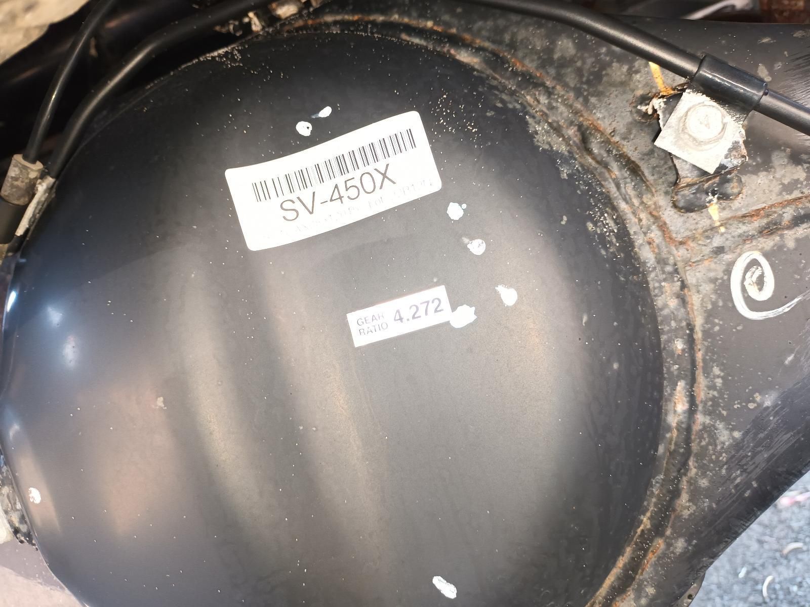 Black Metal Component with Stickers and Dust Inside a Machine Casing — South West 4WD Wreckers In Harristown, QLD