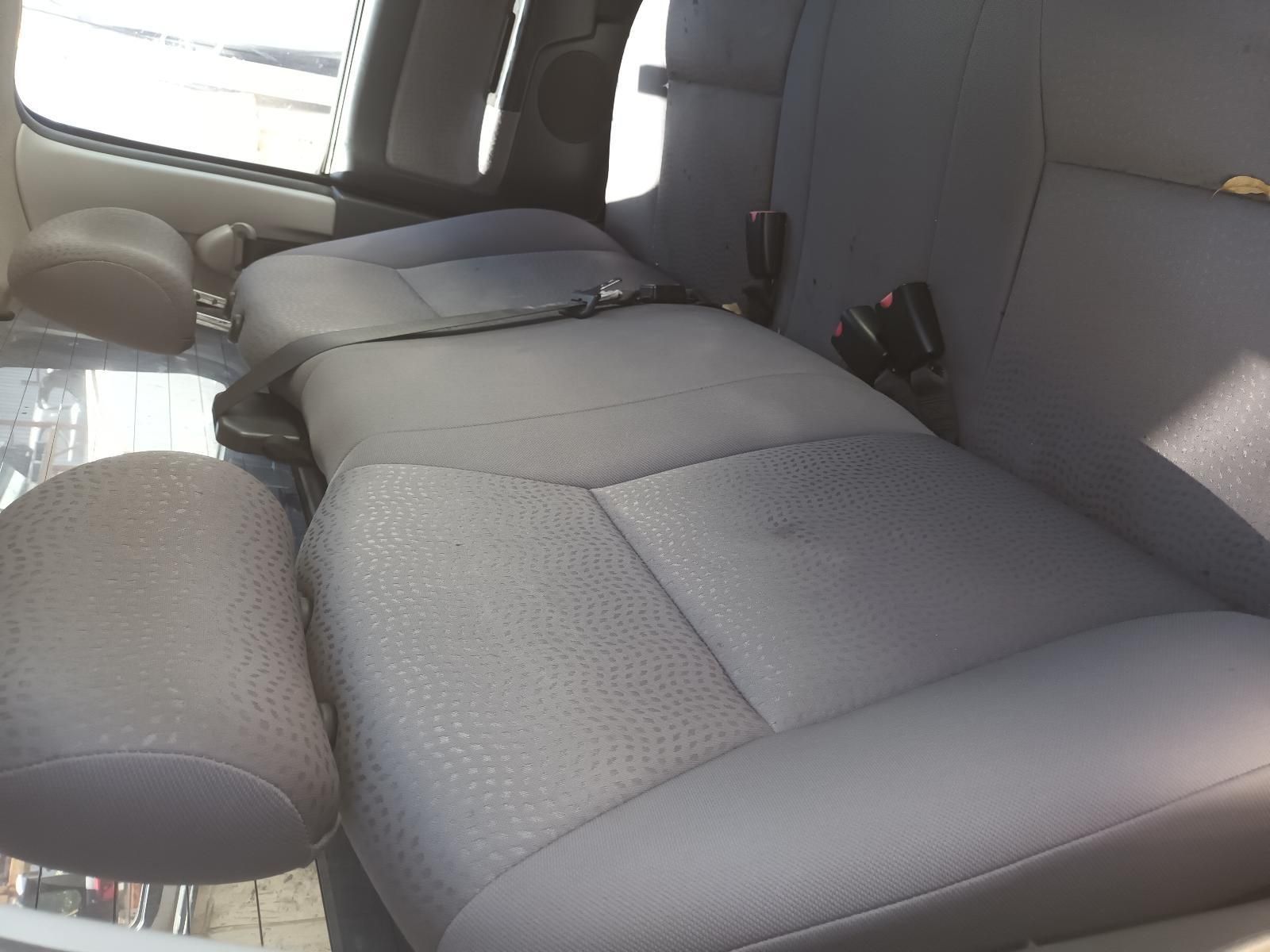 Grey Backseat Folded Flat in A Car Interior — South West 4WD Wreckers In Harristown, QLD