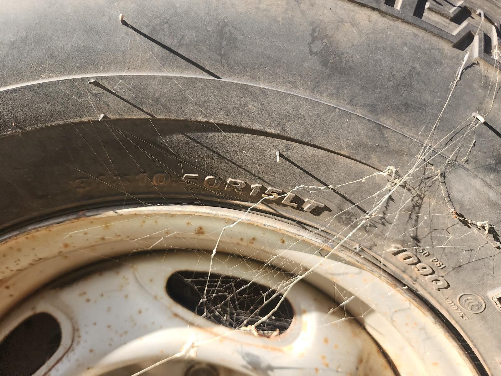 Close-up of a Worn Tire Sidewall With Visible Cracks — South West 4WD Wreckers In Harristown, QLD