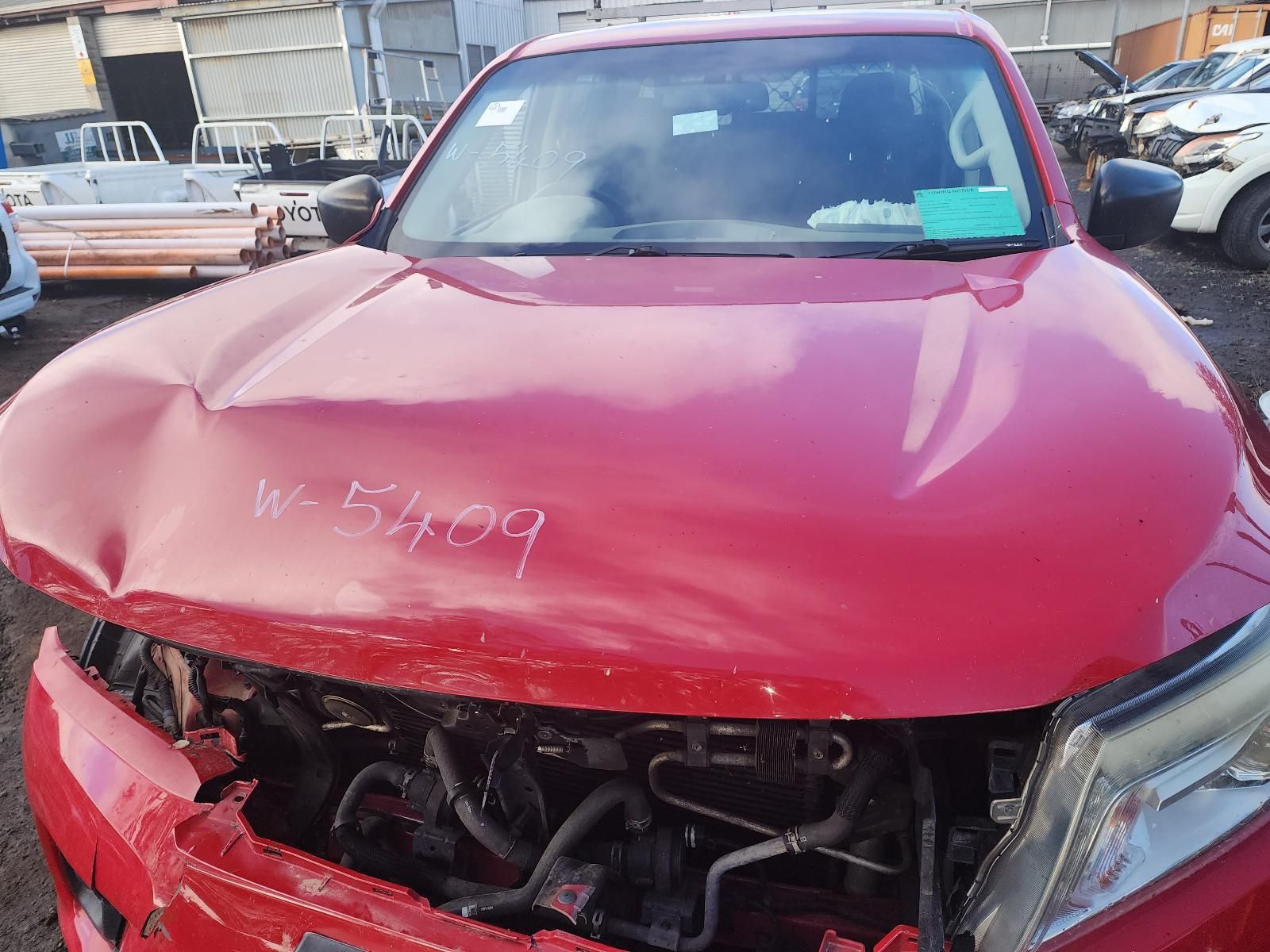 Red Car With a Crushed Front End and Hood Damage — South West 4WD Wreckers In Harristown, QLD