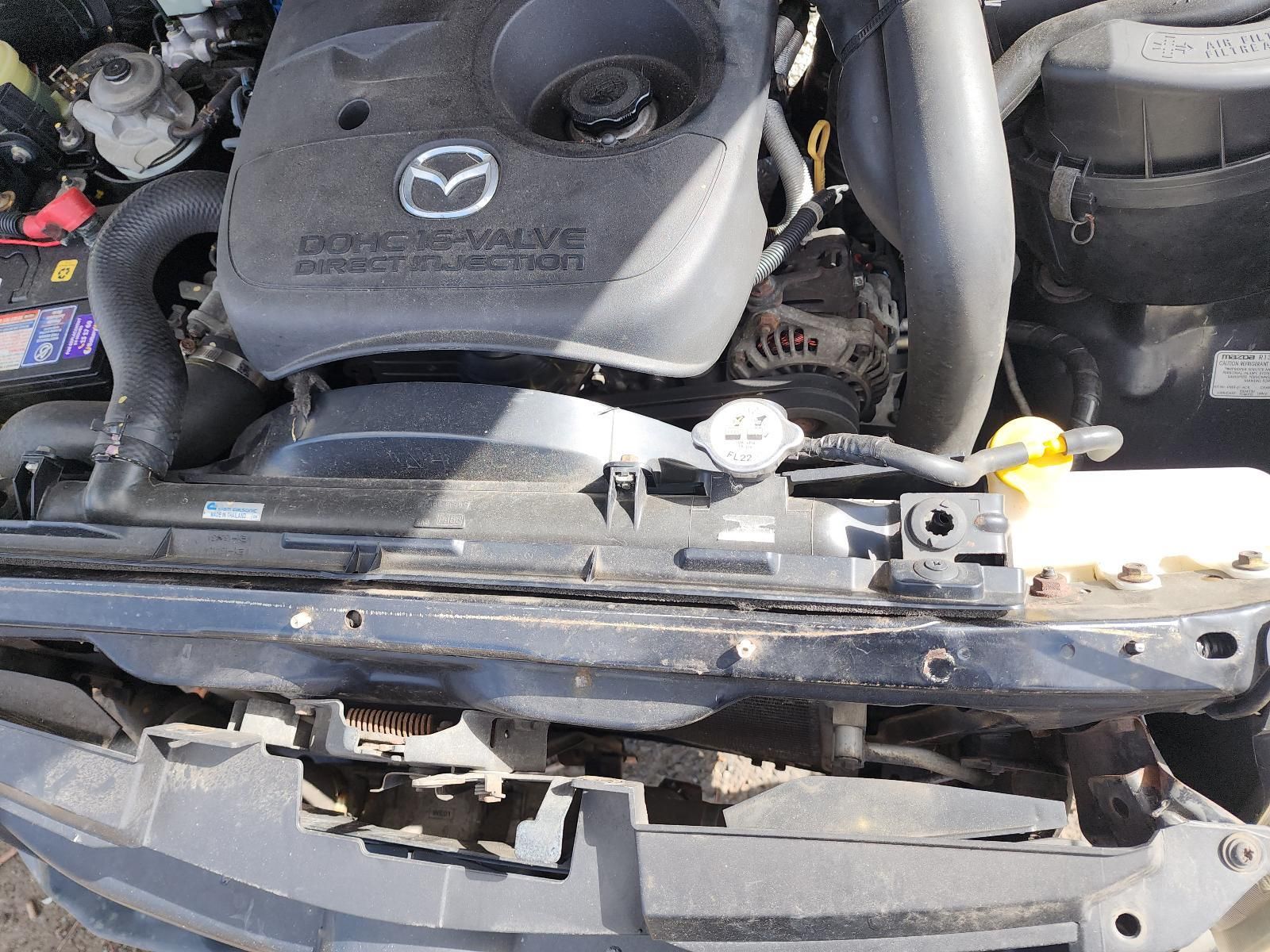 Mazda Engine Bay With Front Grille Removed — South West 4WD Wreckers In Harristown, QLD