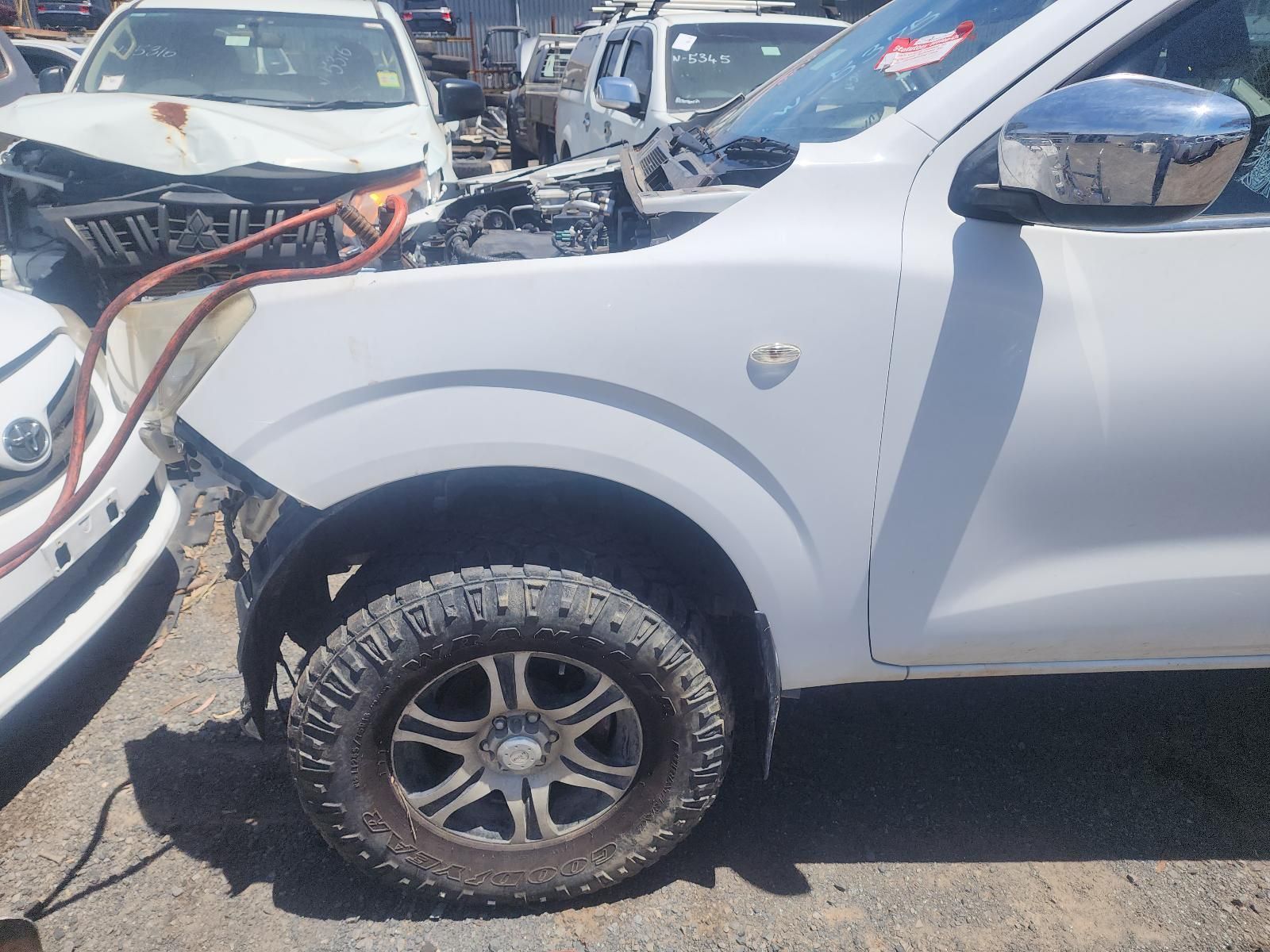 White Pickup Truck With Front-left Damage in a Salvage Yard — South West 4WD Wreckers In Harristown, QLD