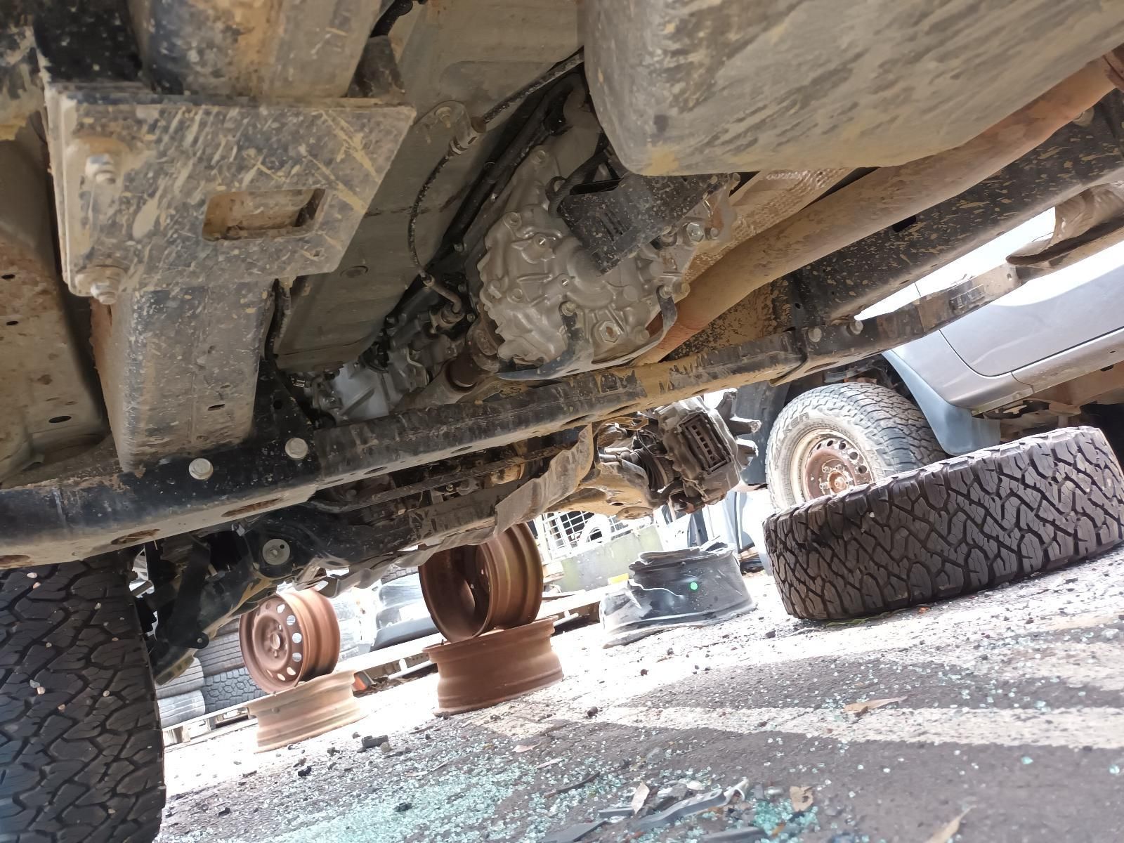Undercarriage of A Vehicle on A Lift, Showing Wheels — South West 4WD Wreckers In Harristown, QLD