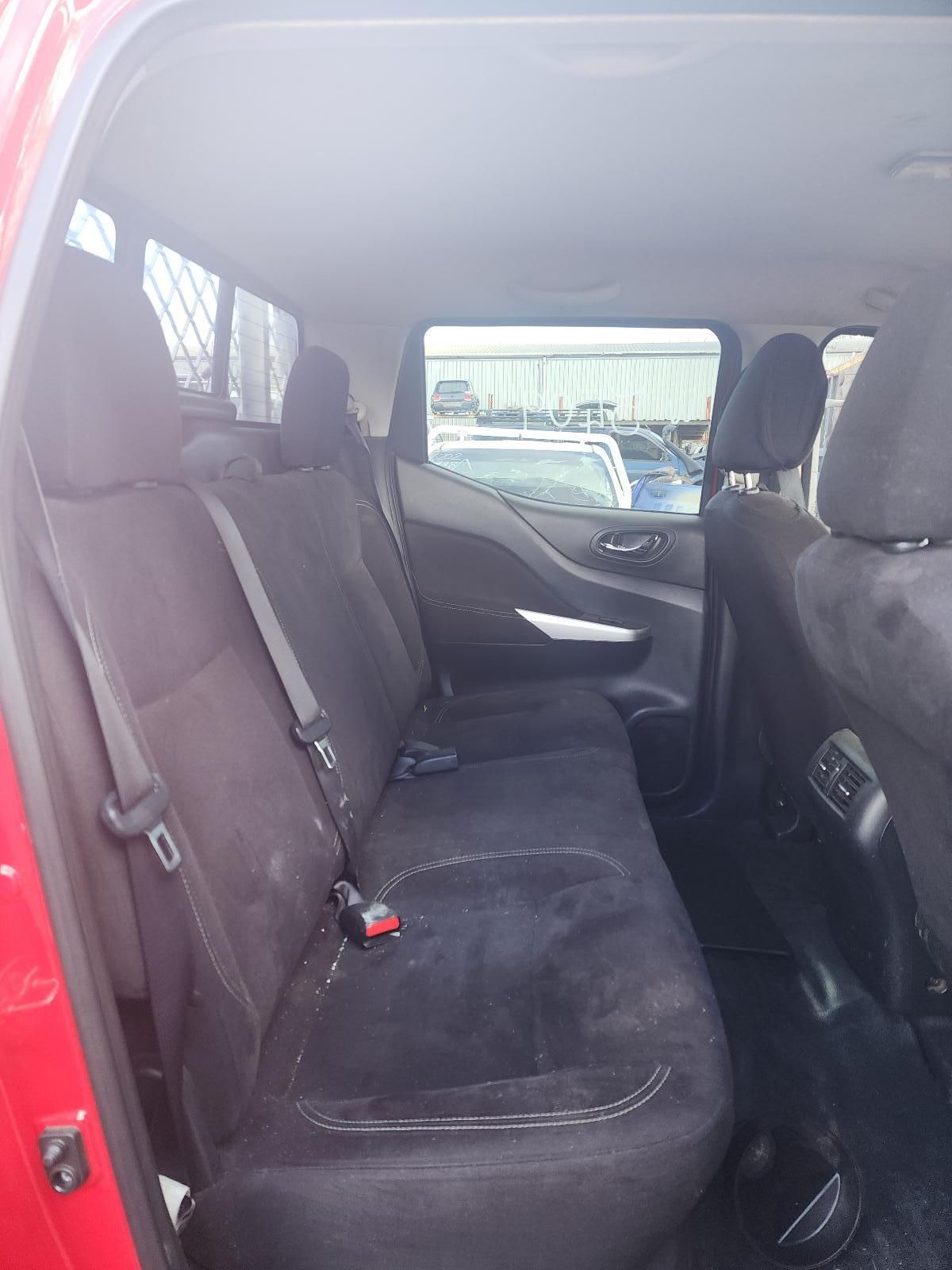 Car Interior With Black Rear Bench Seats in a Red Vehicle — South West 4WD Wreckers In Harristown, QLD