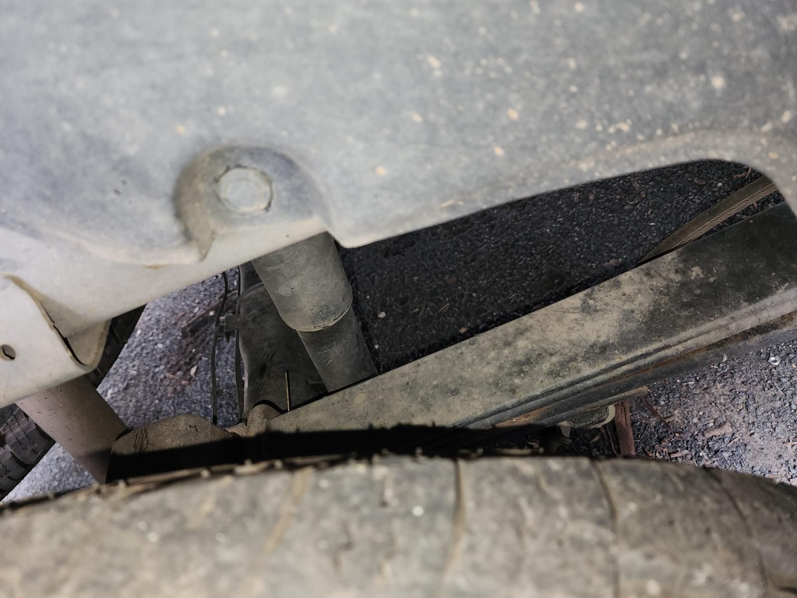 Close-up of a Car Wheel Well and Suspension Components — South West 4WD Wreckers In Harristown, QLD