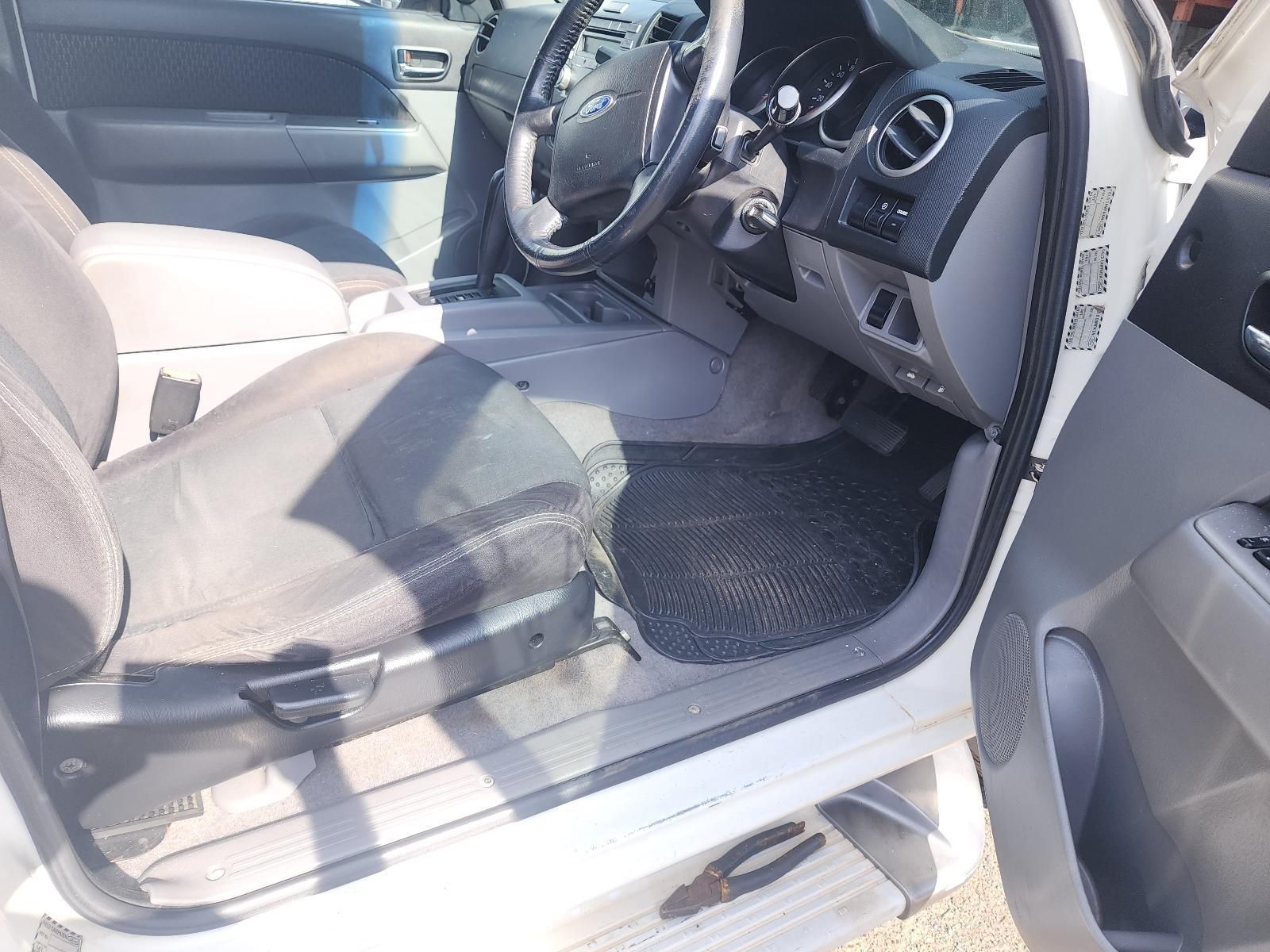 Car Interior With Open Driver Door, Gray Seats — South West 4WD Wreckers In Harristown, QLD