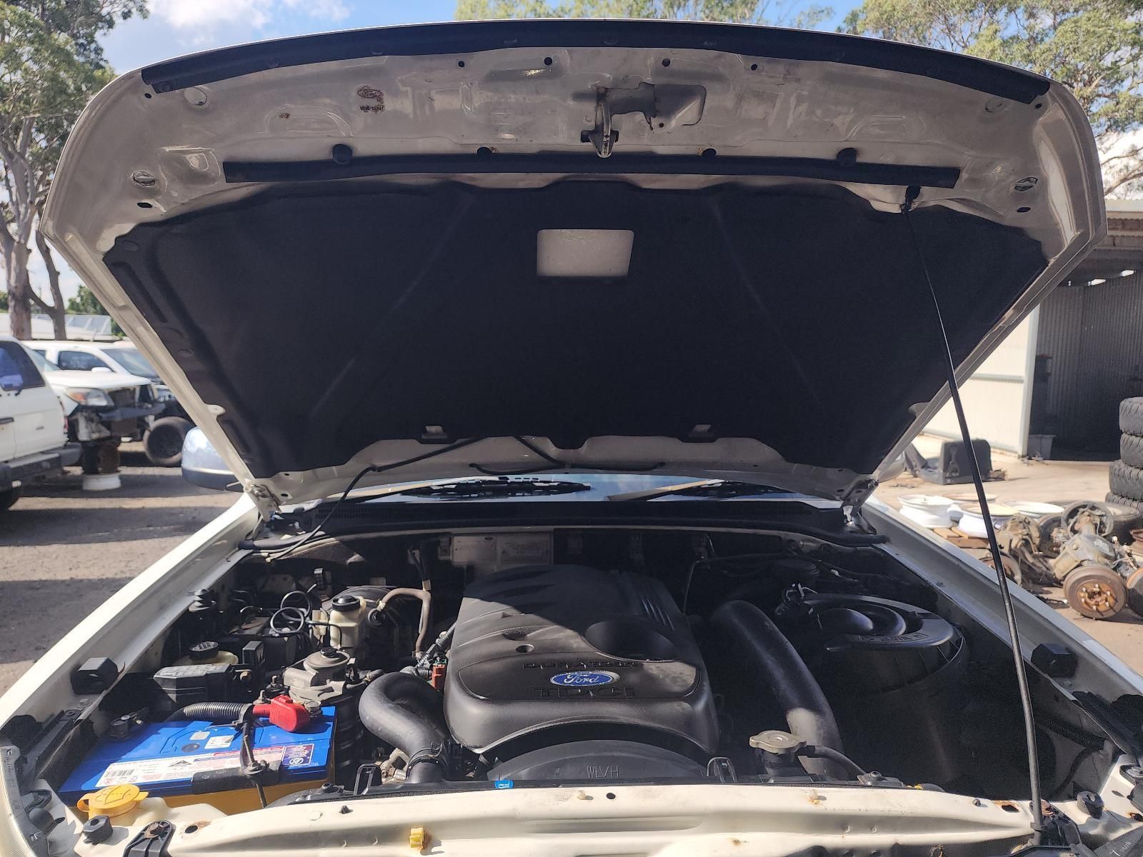 Open Car Hood Showing the Engine Bay — South West 4WD Wreckers In Harristown, QLD