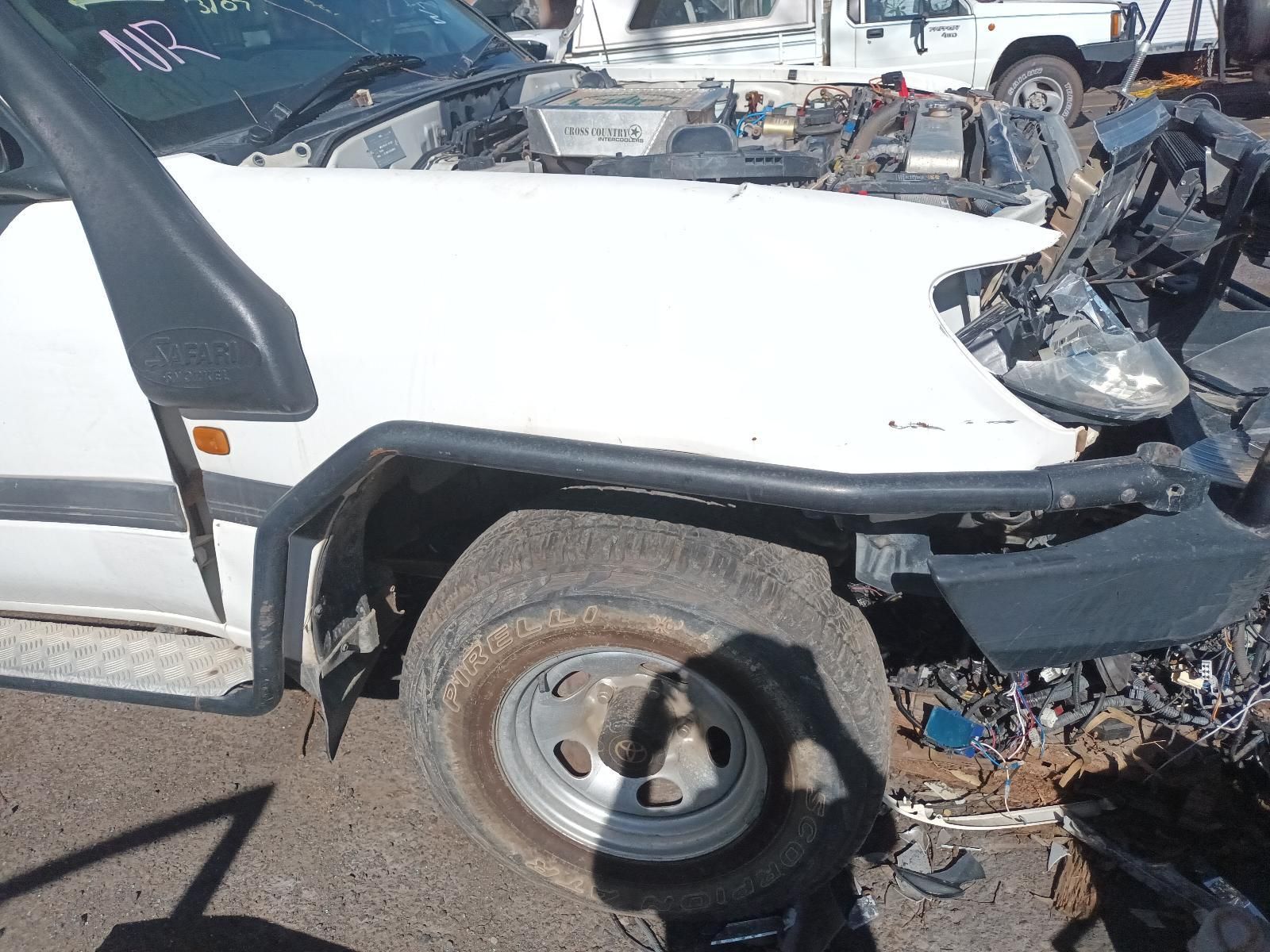 White Pickup Truck with Severe Front-End Damage — South West 4WD Wreckers In Harristown, QLD