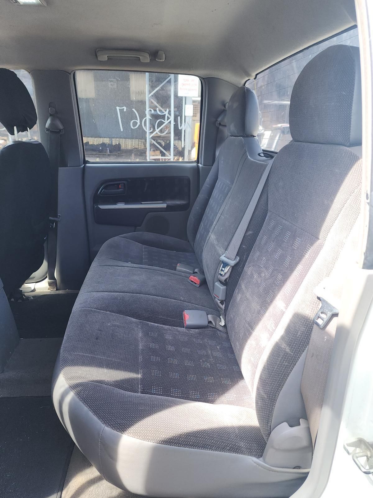 Car Interior With Gray Fabric Back Seat and Seats — South West 4WD Wreckers In Harristown, QLD