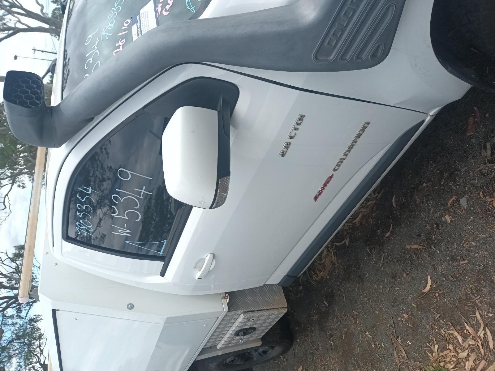 Silver Car Parked on A Wet Street — South West 4WD Wreckers In Harristown, QLD