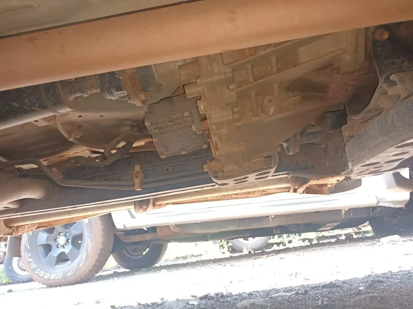 Underside of a Rusty Vehicle, Showing the Drivetrain Components — South West 4WD Wreckers In Harristown, QLD