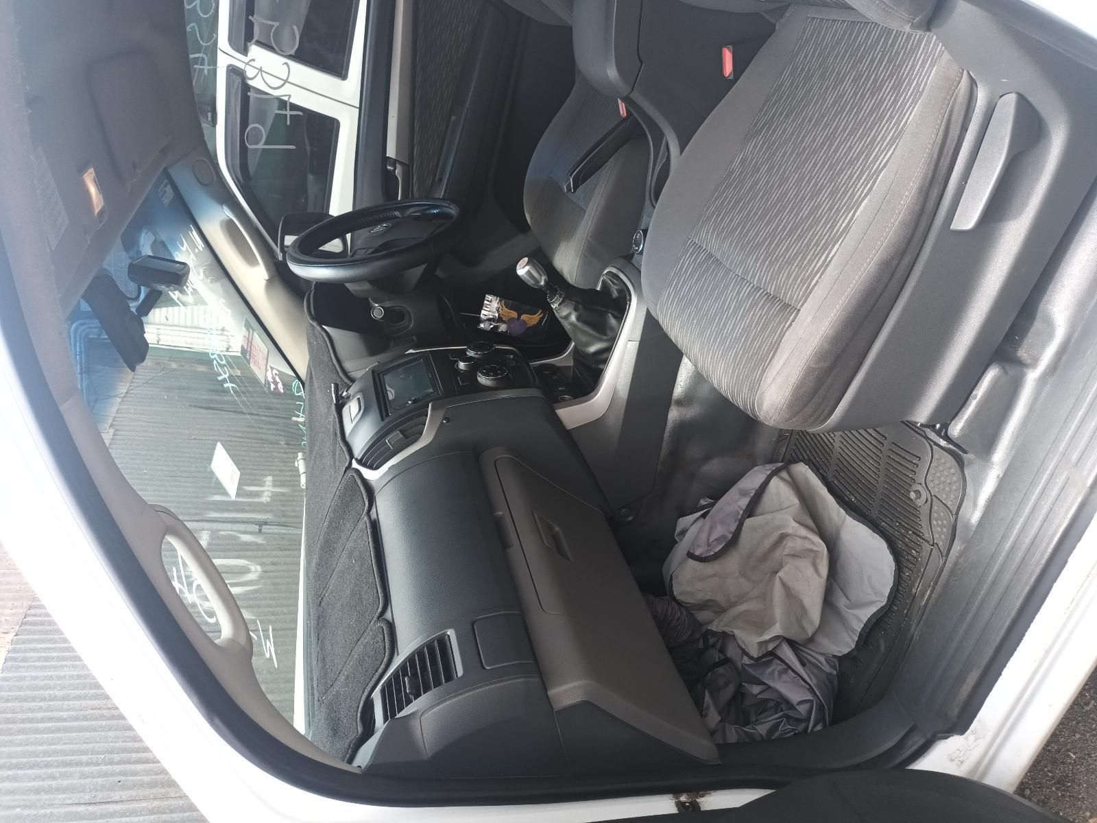 Interior of A Car with The Passenger Seat Filled with Clothes — South West 4WD Wreckers In Harristown, QLD