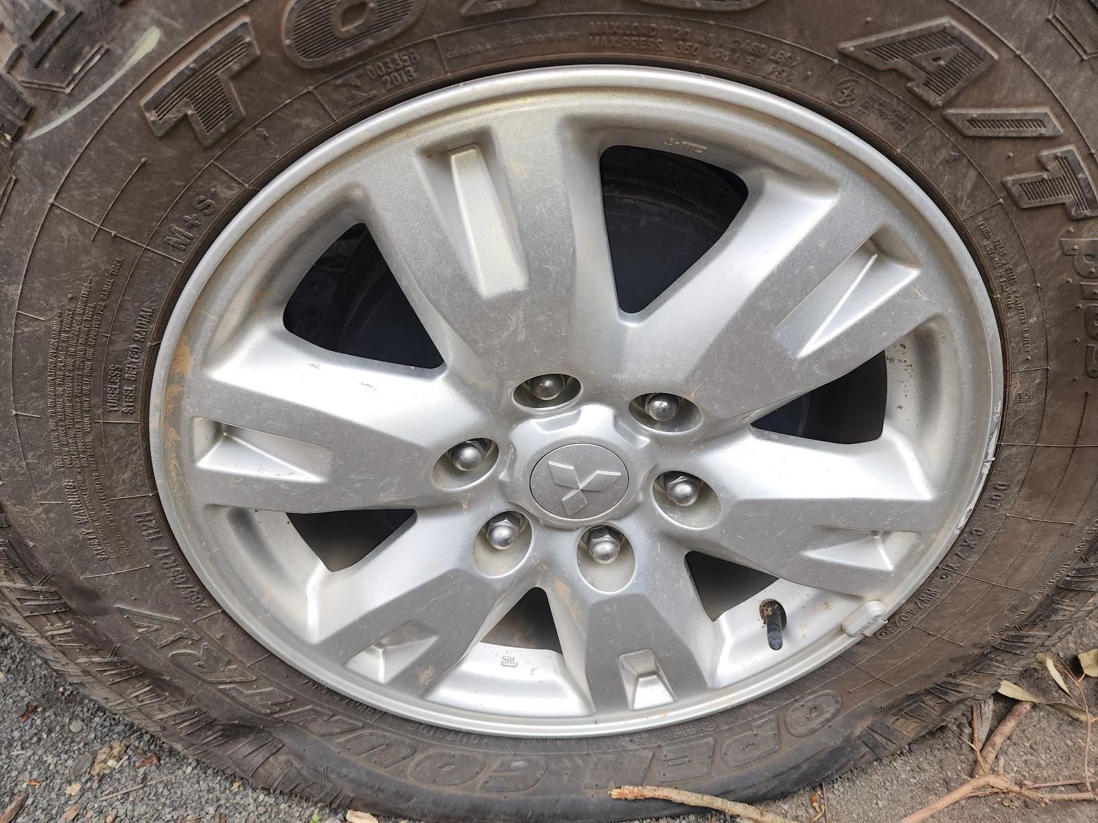 Close-up of a Silver Car Wheel Rim With a Flat — South West 4WD Wreckers In Harristown, QLD