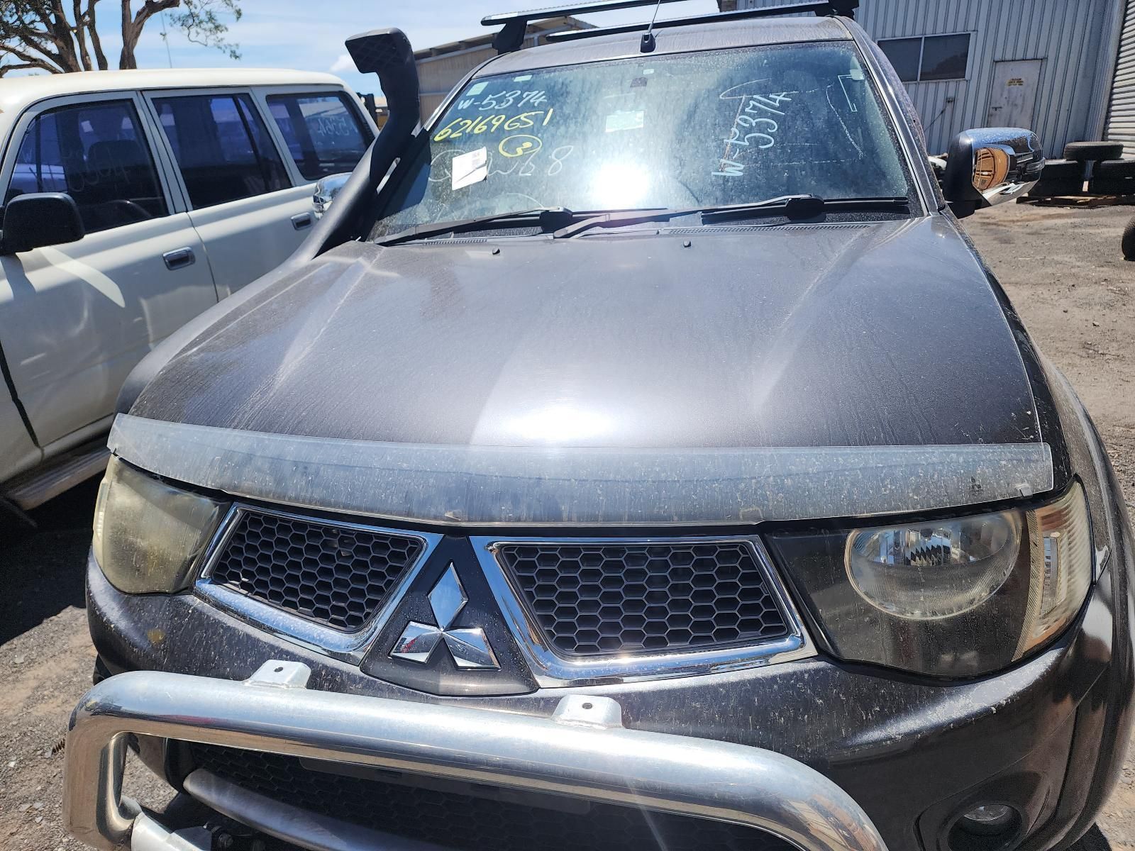 Front View of a Gray Mitsubishi SUV in a Used Car Lot — South West 4WD Wreckers In Harristown, QLD