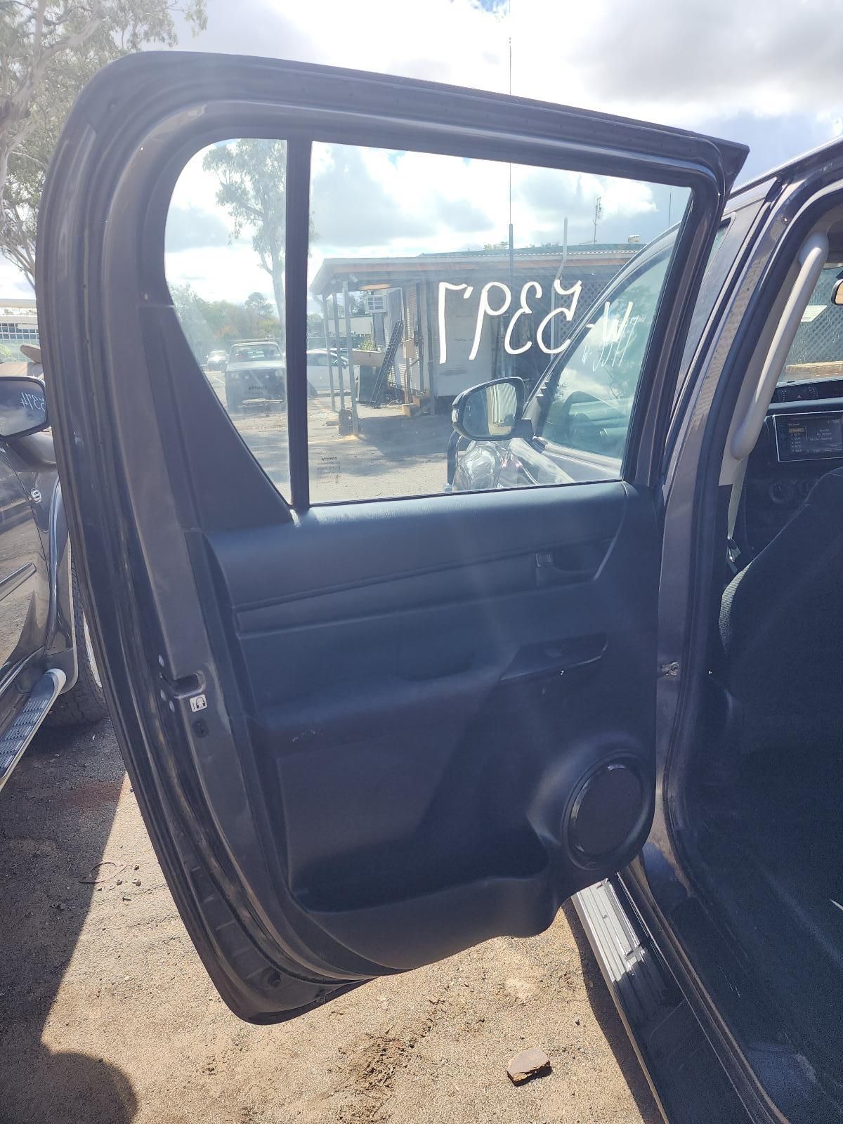 Open Car Rear Door Showing Black Interior — South West 4WD Wreckers In Harristown, QLD
