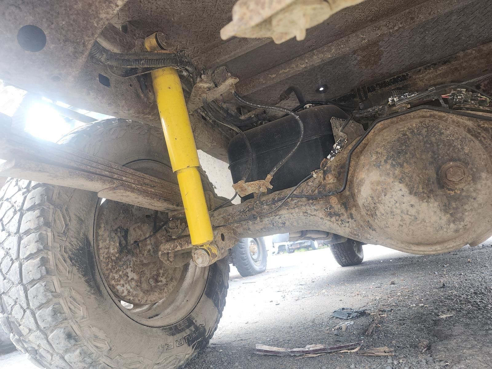 Undercarriage of a Muddy Vehicle — South West 4WD Wreckers In Harristown, QLD