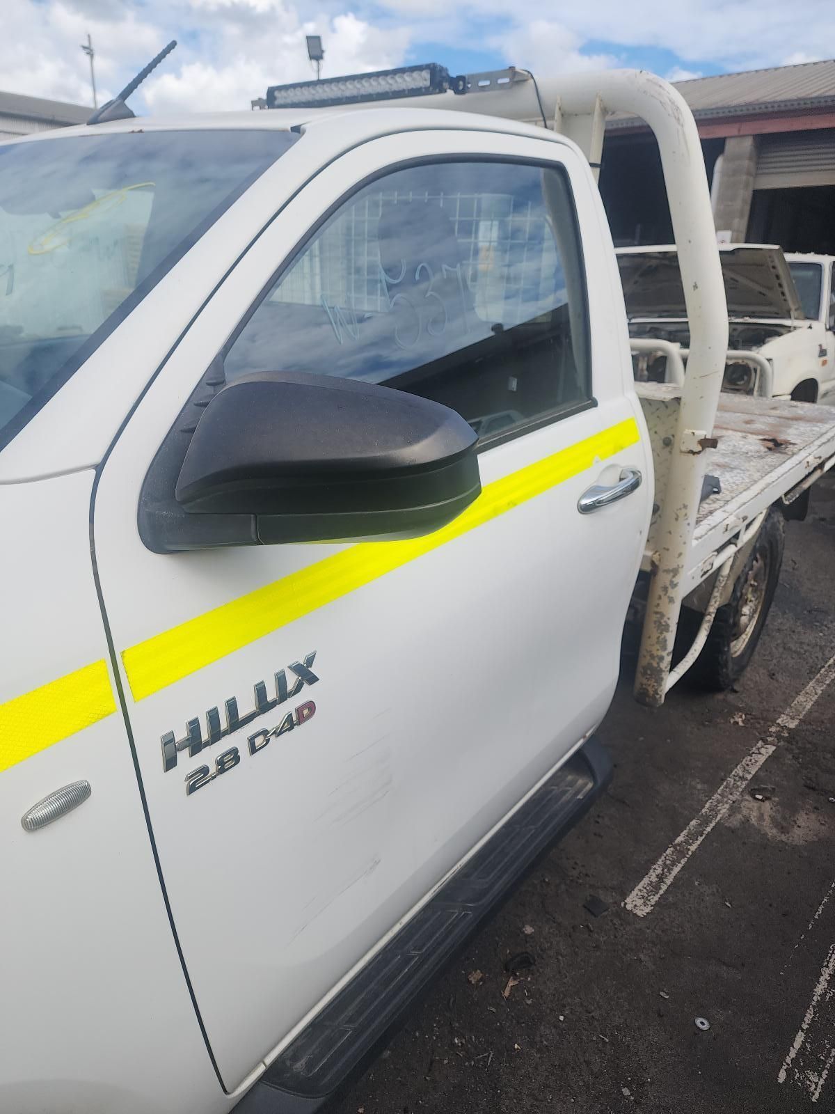 White Toyota Hilux Work Truck — South West 4WD Wreckers In Harristown, QLD