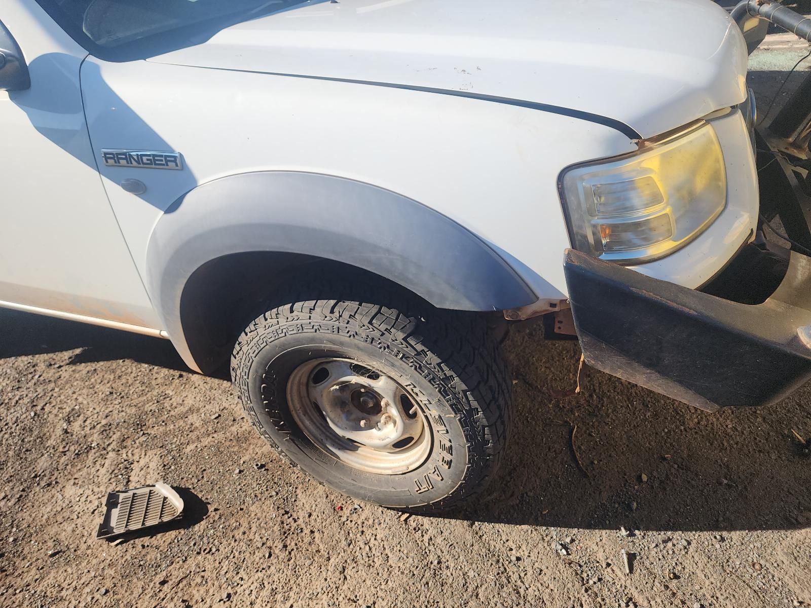 White Pickup Truck With Front-right Wheel Damaged — South West 4WD Wreckers In Harristown, QLD