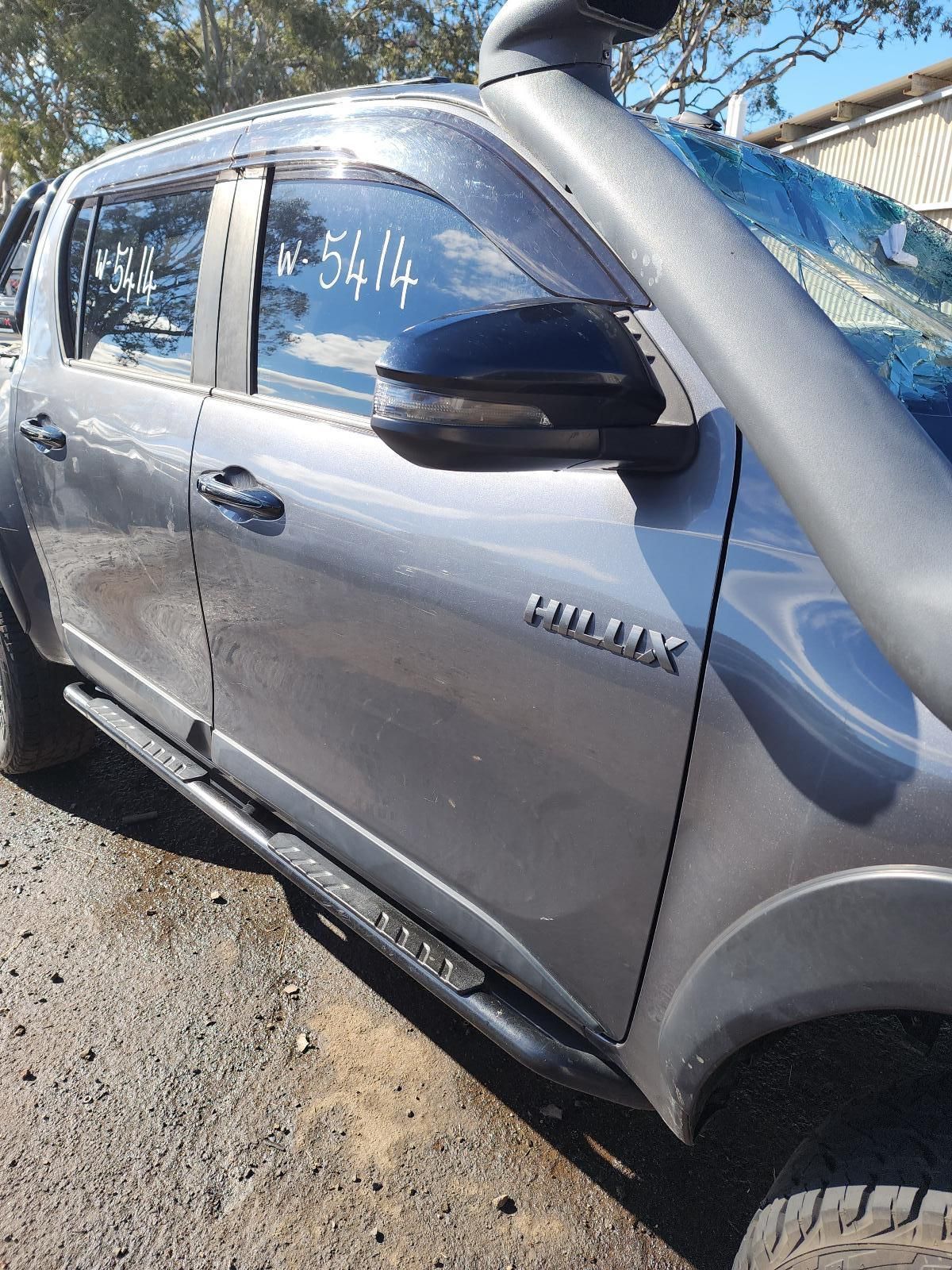 Silver SUV With Dented Front Door and Side Step — South West 4WD Wreckers In Harristown, QLD