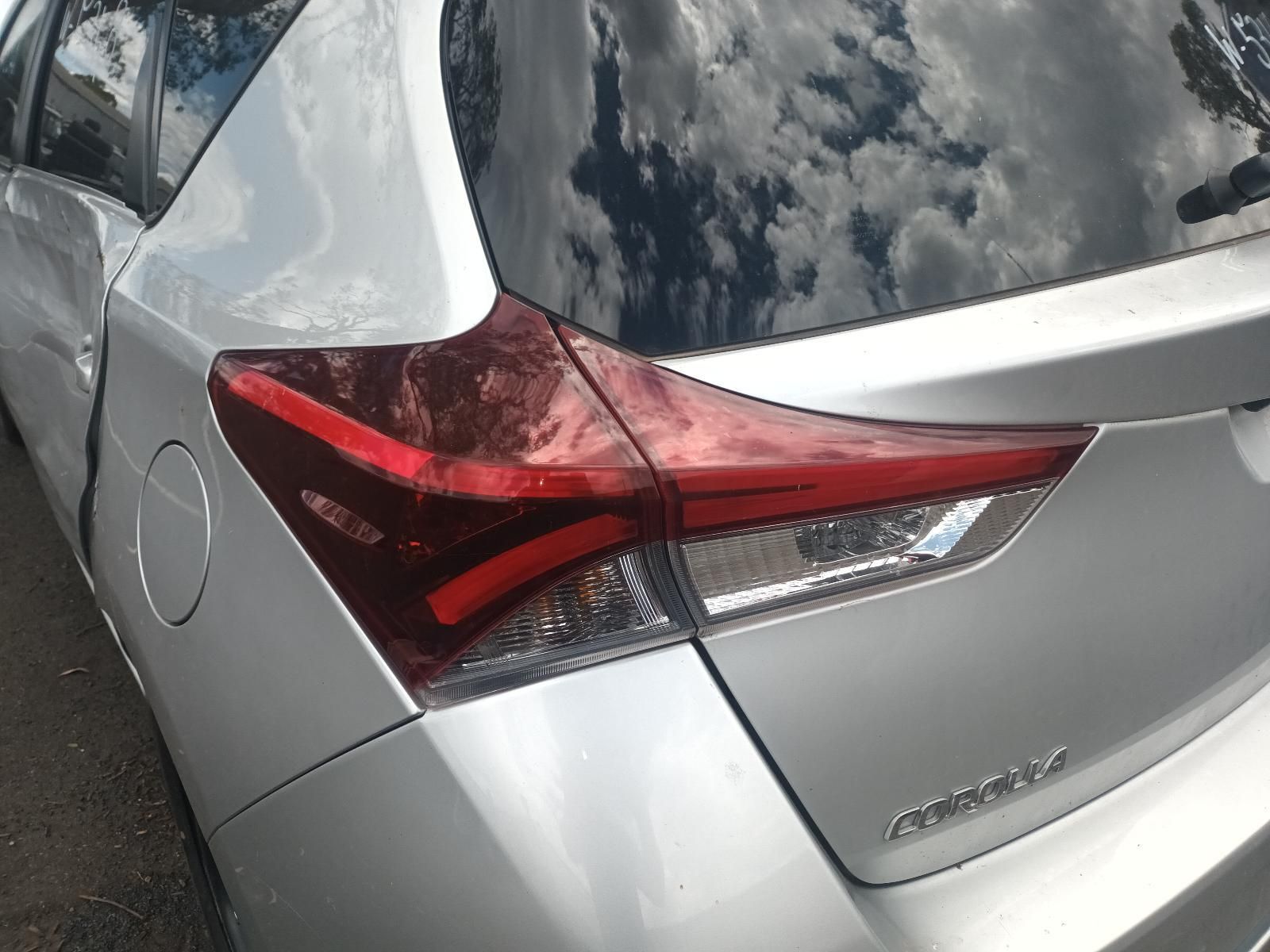 Close-Up of A Silver Car’s Rear Taillight with A Red Lens — South West 4WD Wreckers In Harristown, QLD