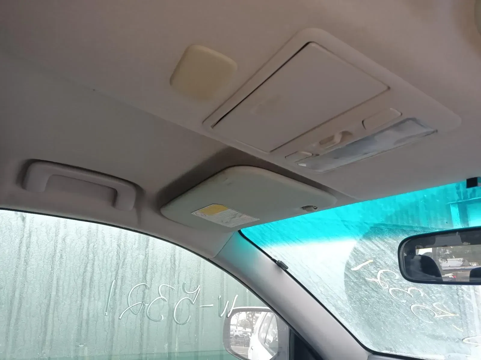 Interior Car Roof: Visor, Overhead Console, Handle, and Windshield — South West 4WD Wreckers In Harristown, QLD