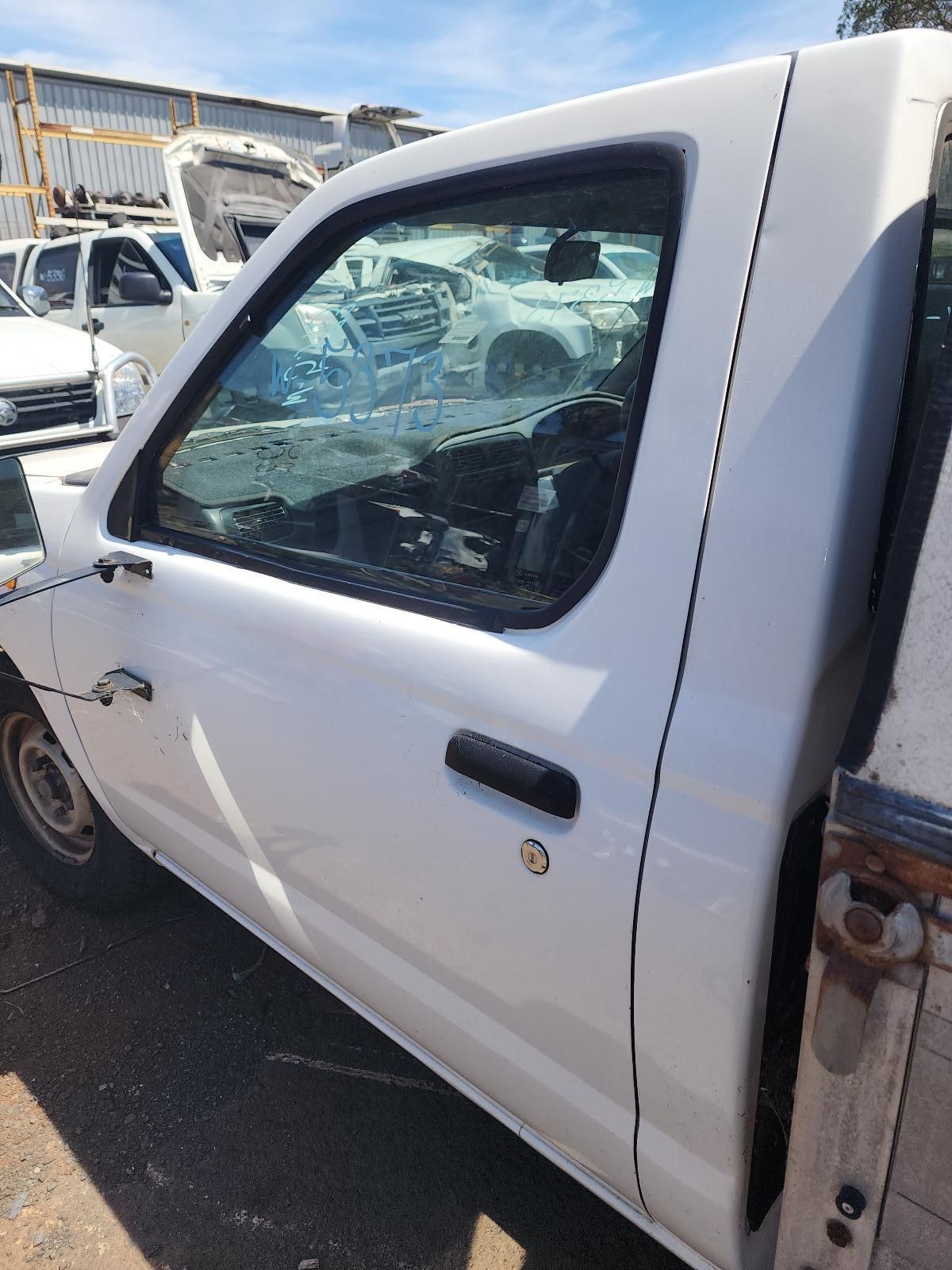 White Pickup Truck Door With a Shattered Side — South West 4WD Wreckers In Harristown, QLD