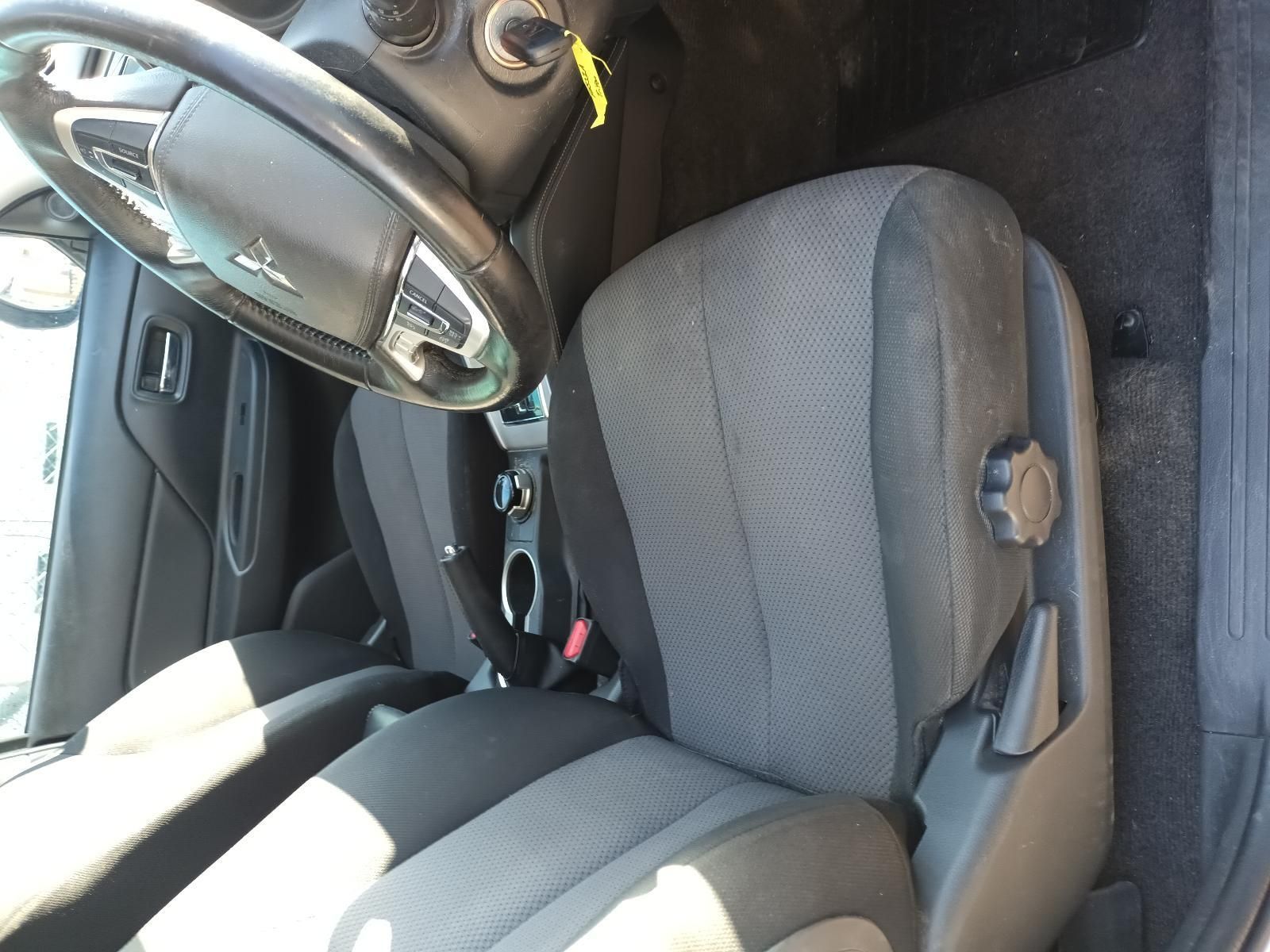 Car Interior with Grey Front Seats, Steering Wheel — South West 4WD Wreckers In Harristown, QLD