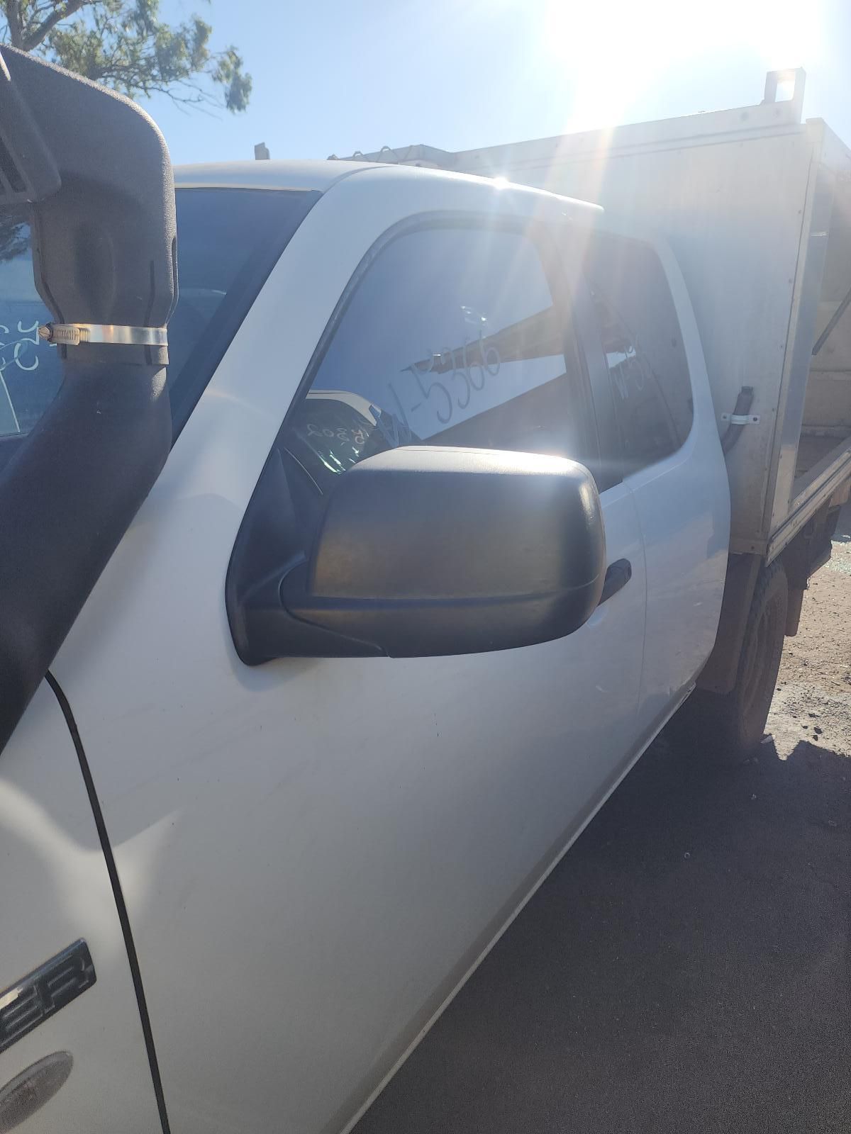 White Pickup Truck Side View in Bright Sunlight — South West 4WD Wreckers In Harristown, QLD