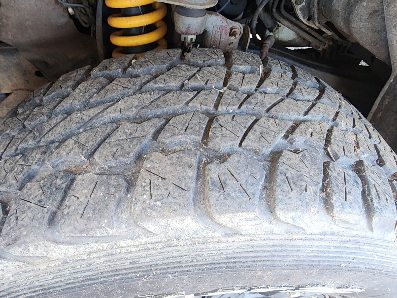 Close-up of a Worn Car Tyre — South West 4WD Wreckers In Harristown, QLD