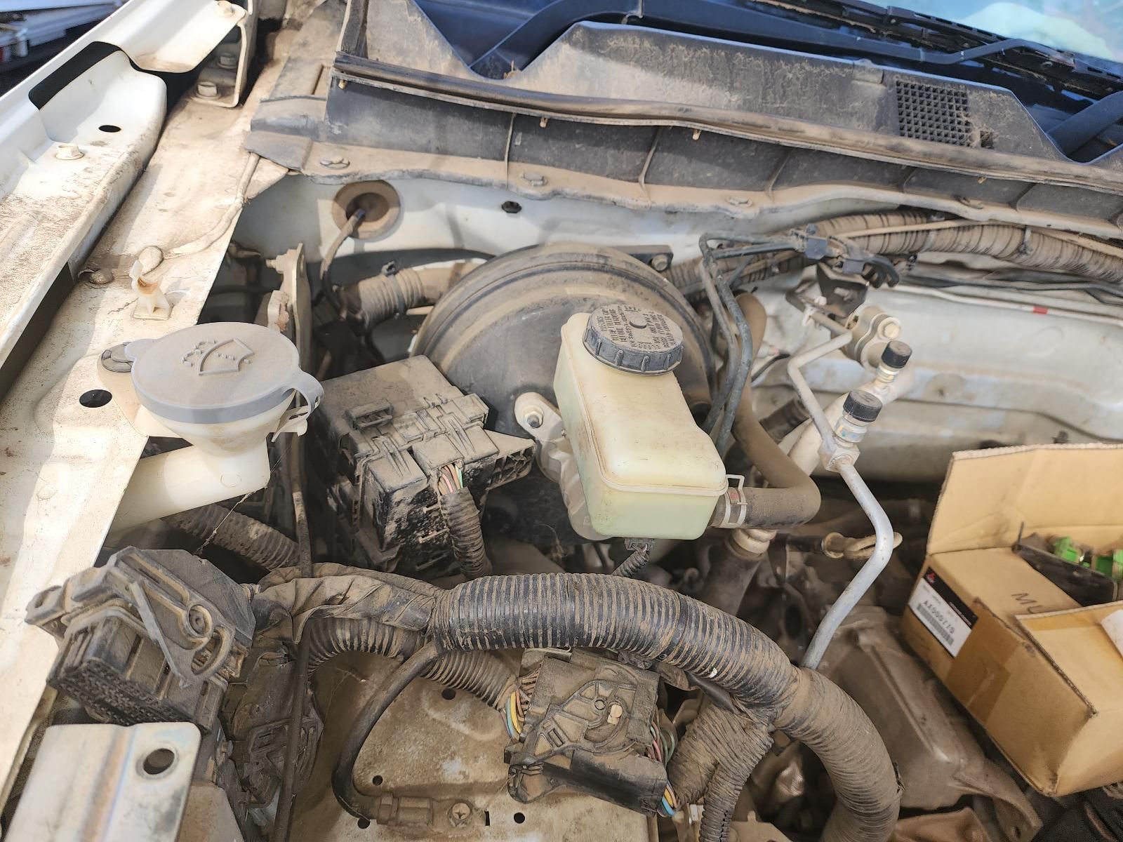 Open Car Engine Bay With Dusty Components — South West 4WD Wreckers In Harristown, QLD