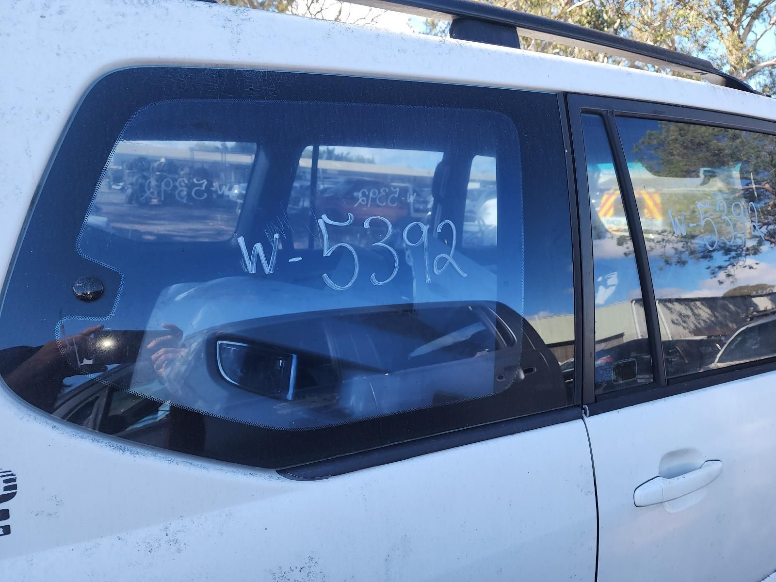 White Car With a Shattered Rear Side Window — South West 4WD Wreckers In Harristown, QLD