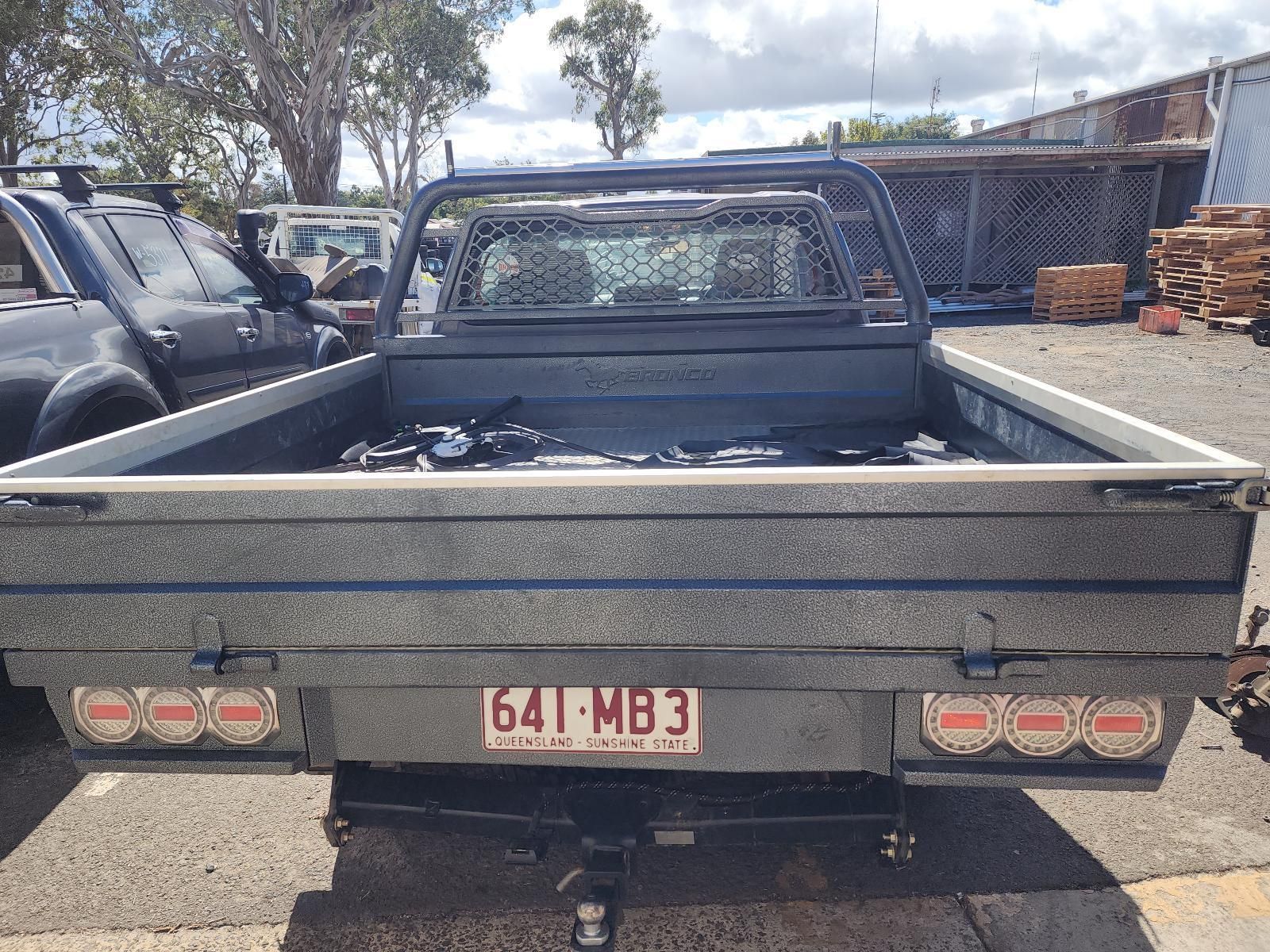 Rear View of a Black Pickup Truck With an Empty Bed — South West 4WD Wreckers In Harristown, QLD