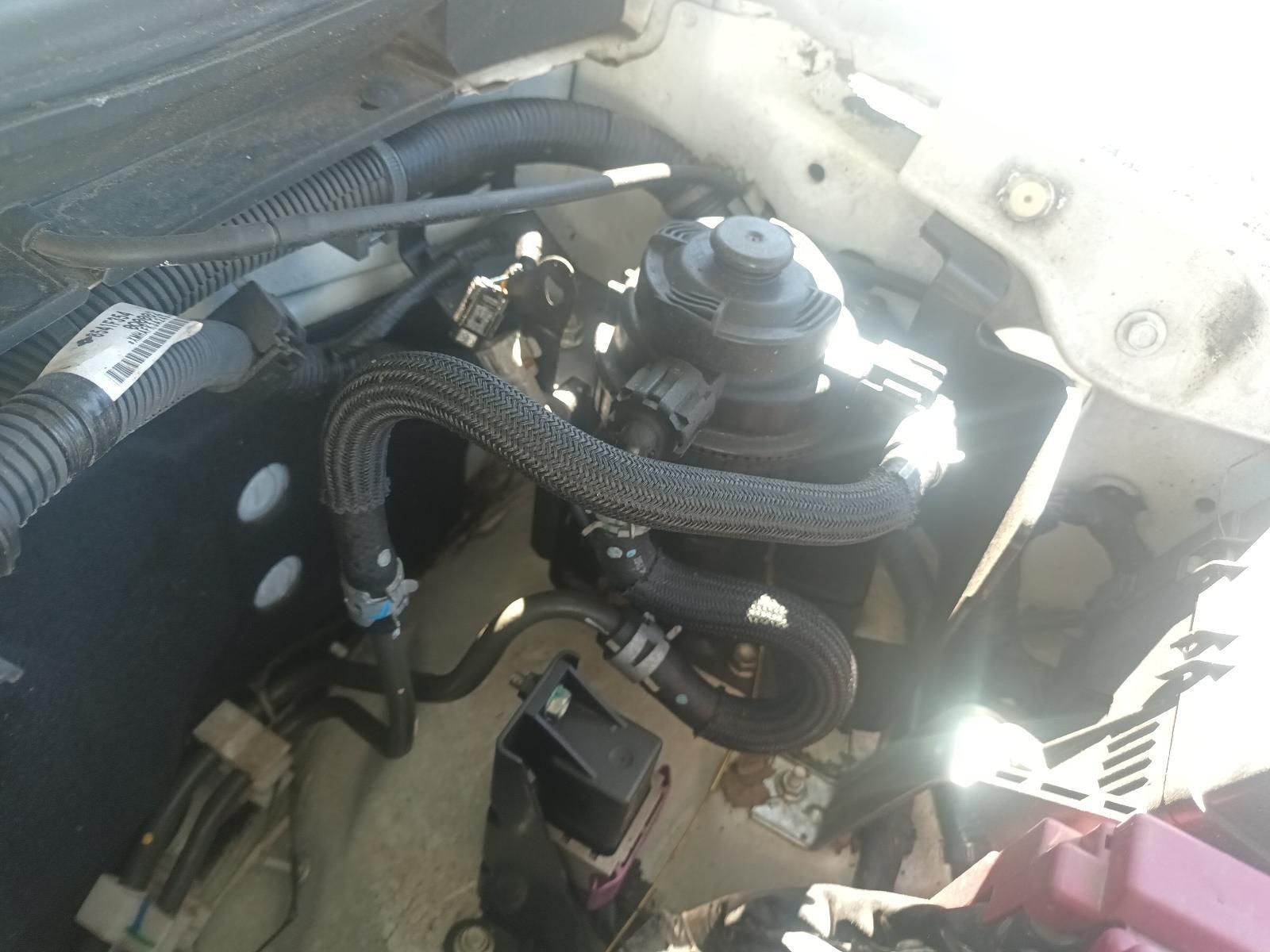 Car Engine Bay with Hoses, Wiring, and A Visible Brake Fluid Reservoir — South West 4WD Wreckers In Harristown, QLD