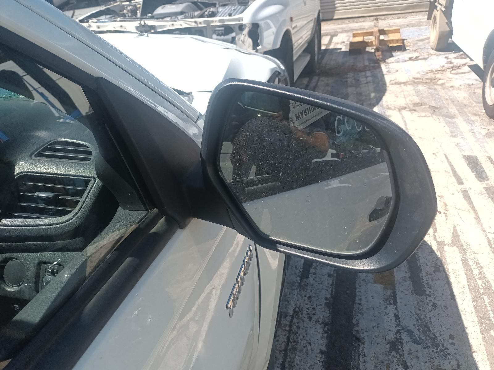 Car’s Side Mirror Reflecting a Sunny Roadside with Parked Vehicles — South West 4WD Wreckers In Harristown, QLD