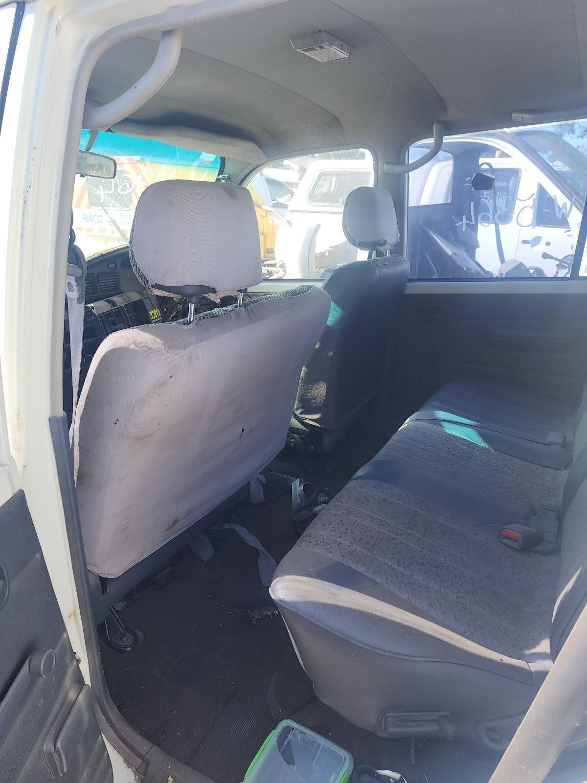 Inside a Car, Showing the Rear Seats and Front Seat Backs — South West 4WD Wreckers In Harristown, QLD