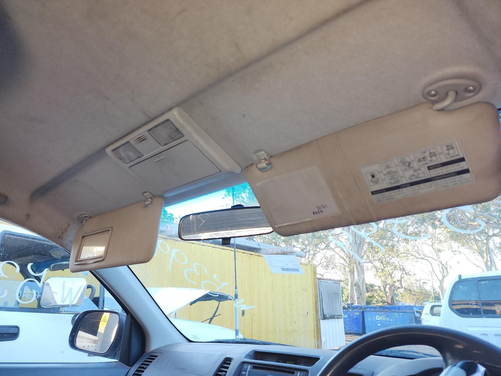 Car Interior With Sun Visors and Rearview Mirror — South West 4WD Wreckers In Harristown, QLD