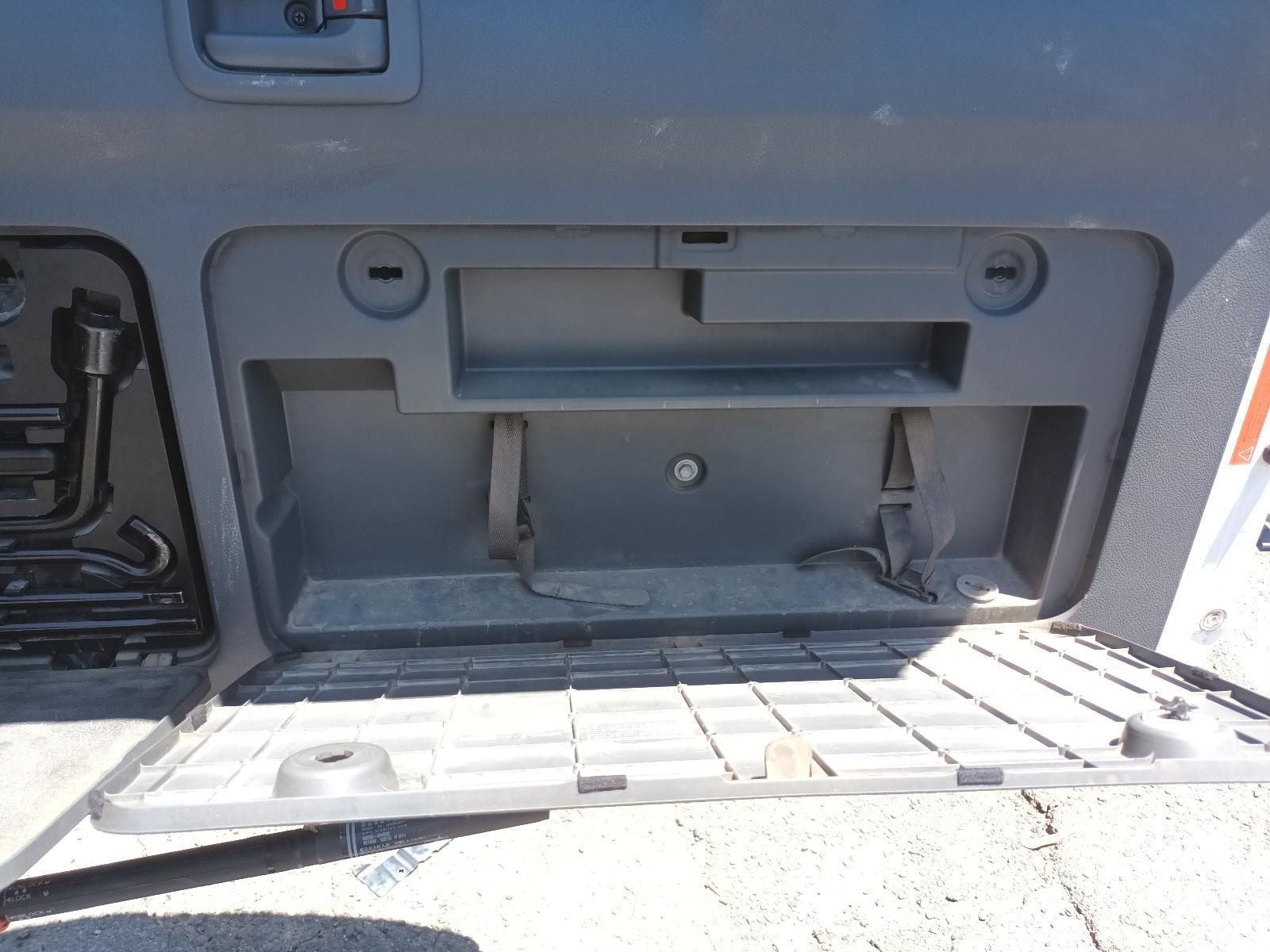 Open Storage Compartment with An Empty Grey Compartment — South West 4WD Wreckers In Harristown, QLD